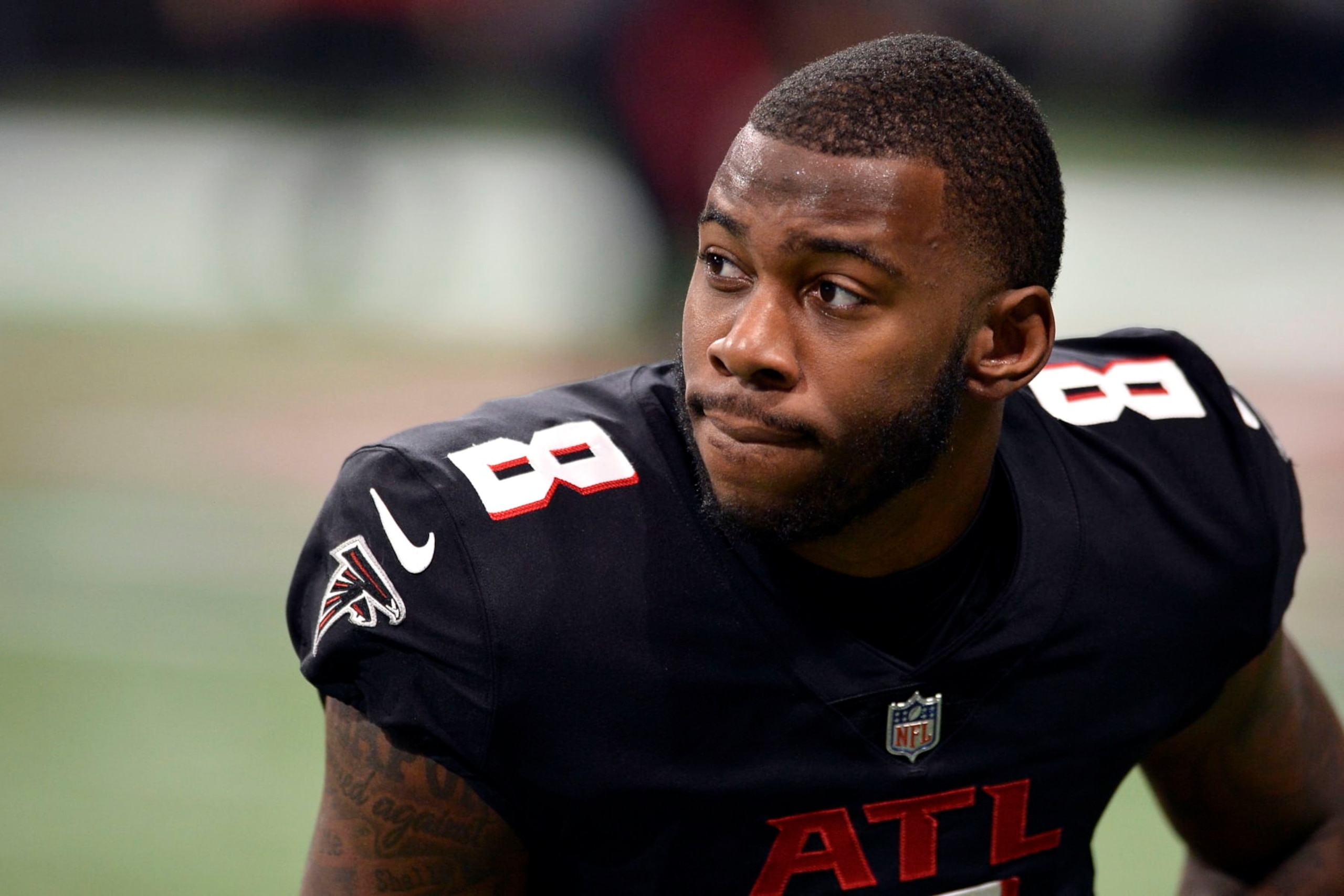 ATLANTA, GA - JANUARY 09: Kyle Pitts #8 of the Atlanta Falcons sits up during warmups before a game against the New Orleans Saints at Mercedes-Benz Stadium on January 9, 2022 in Atlanta, Georgia. (Photo by Edward M. Pio Roda/Getty Images)