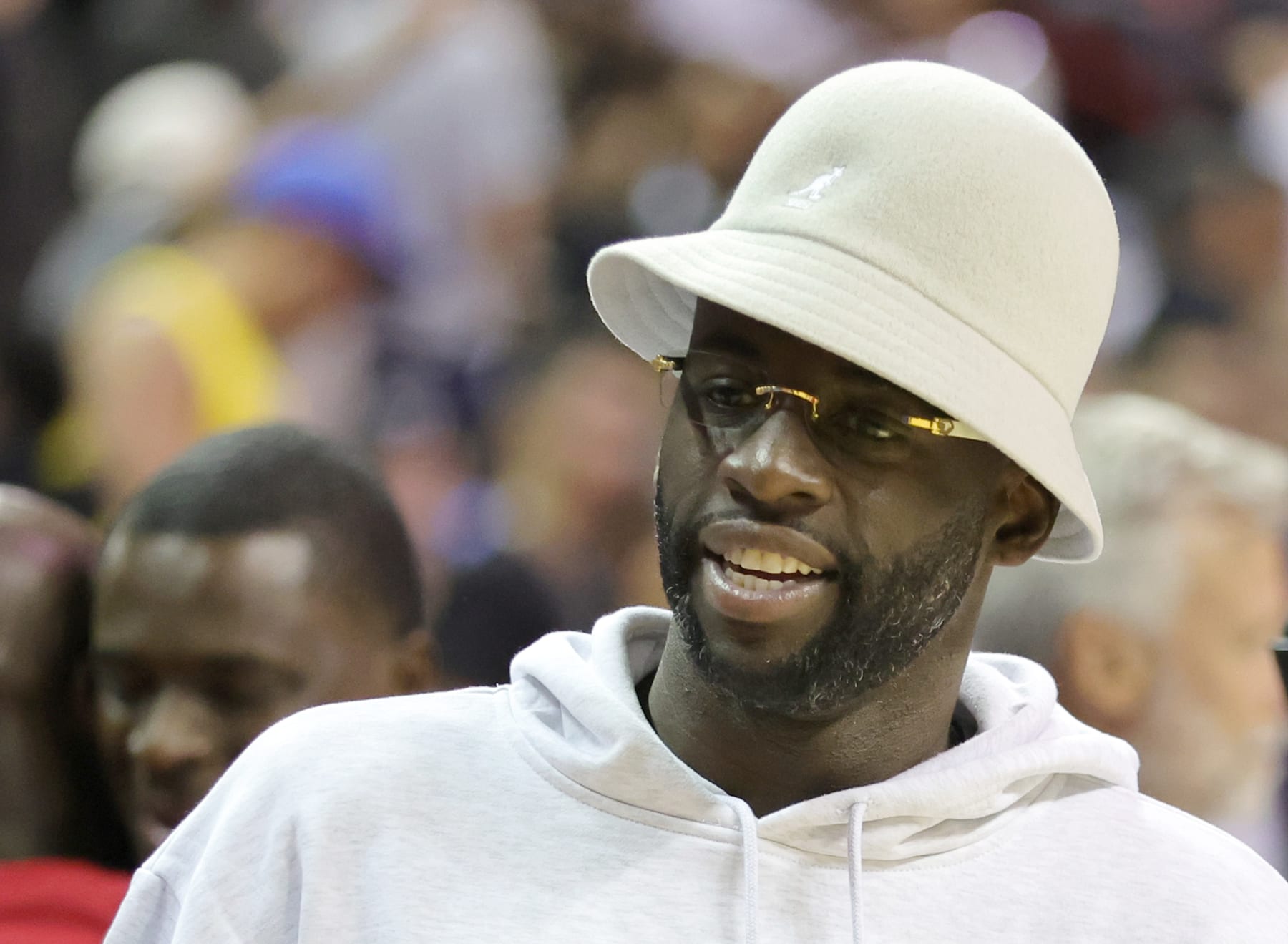 LAS VEGAS, NEVADA - JULY 08: Draymond Green of the Golden State Warriors attends a game between the Warriors and the New York Knicks during the 2022 NBA Summer League at the Thomas & Mack Center on July 08, 2022 in Las Vegas, Nevada. NOTE TO USER: User expressly acknowledges and agrees that, by downloading and or using this photograph, User is consenting to the terms and conditions of the Getty Images License Agreement. (Photo by Ethan Miller/Getty Images)