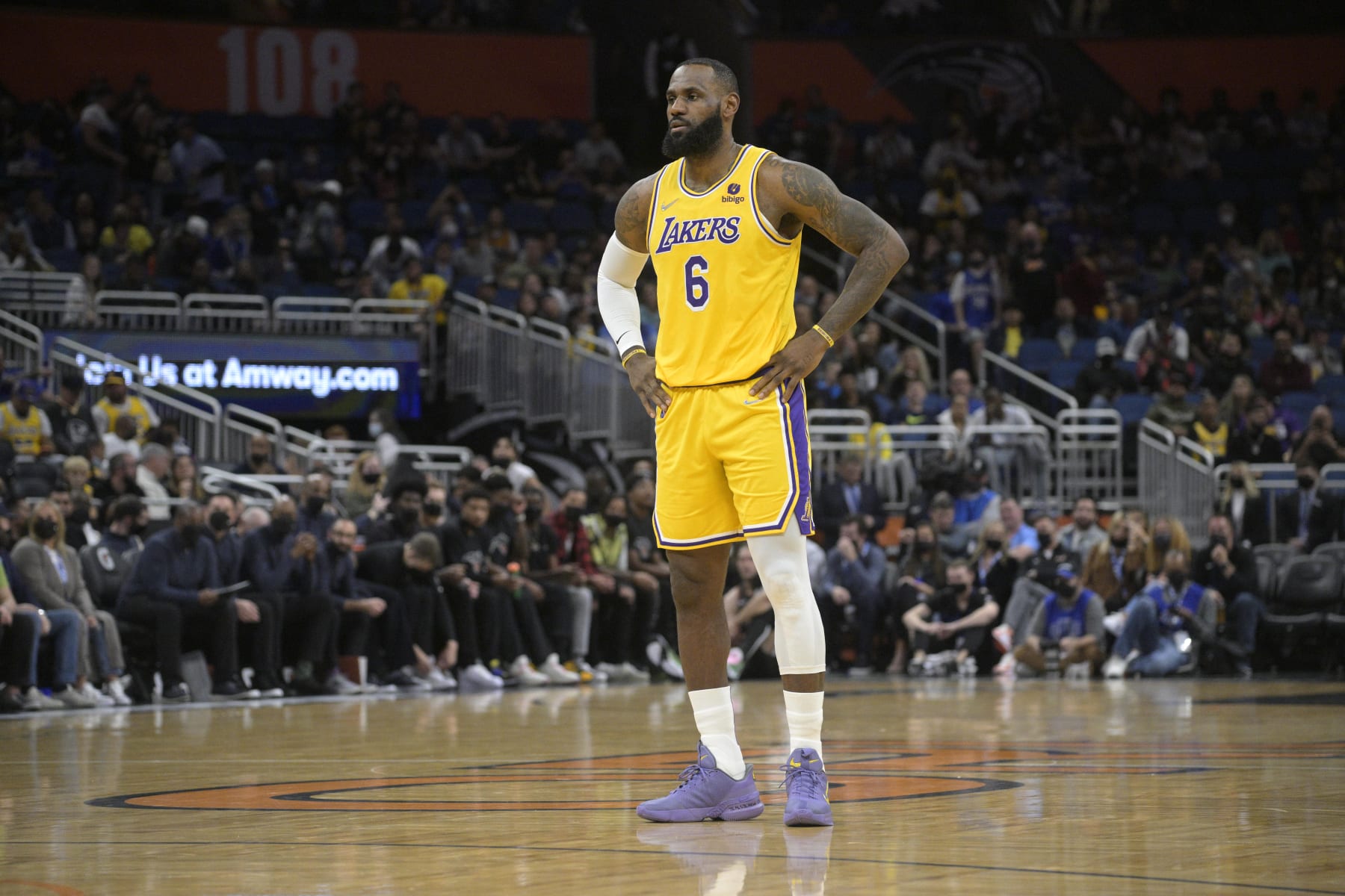 Los Angeles Lakers forward LeBron James (6) stands win the court during the first half of an NBA basketball game against the Orlando Magic, Friday, Jan. 21, 2022, in Orlando, Fla. (AP Photo/Phelan M. Ebenhack)