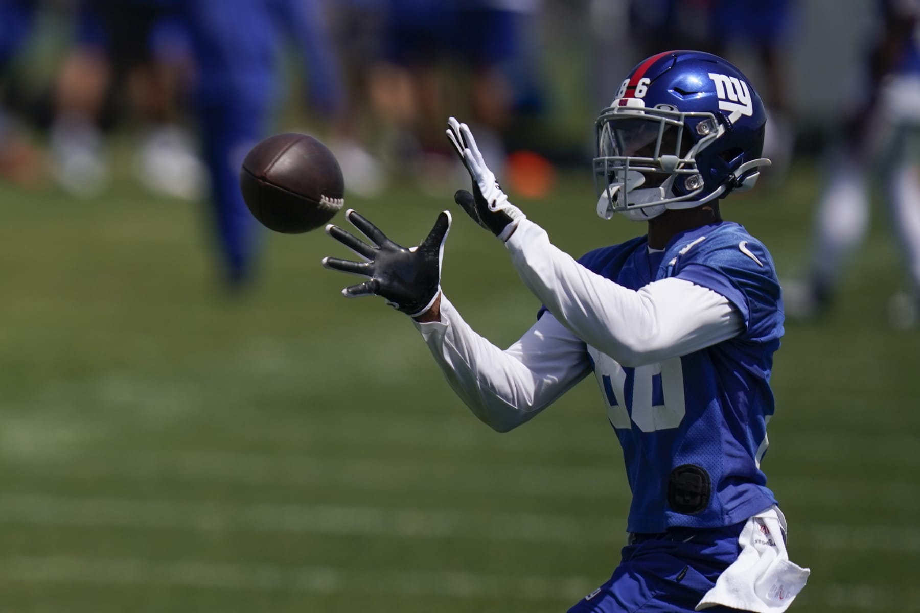 New York Giants' Darius Slayton participates in a practice at the NFL football team's training facility in East Rutherford, N.J., Wednesday, June 8, 2022. (AP Photo/Seth Wenig)