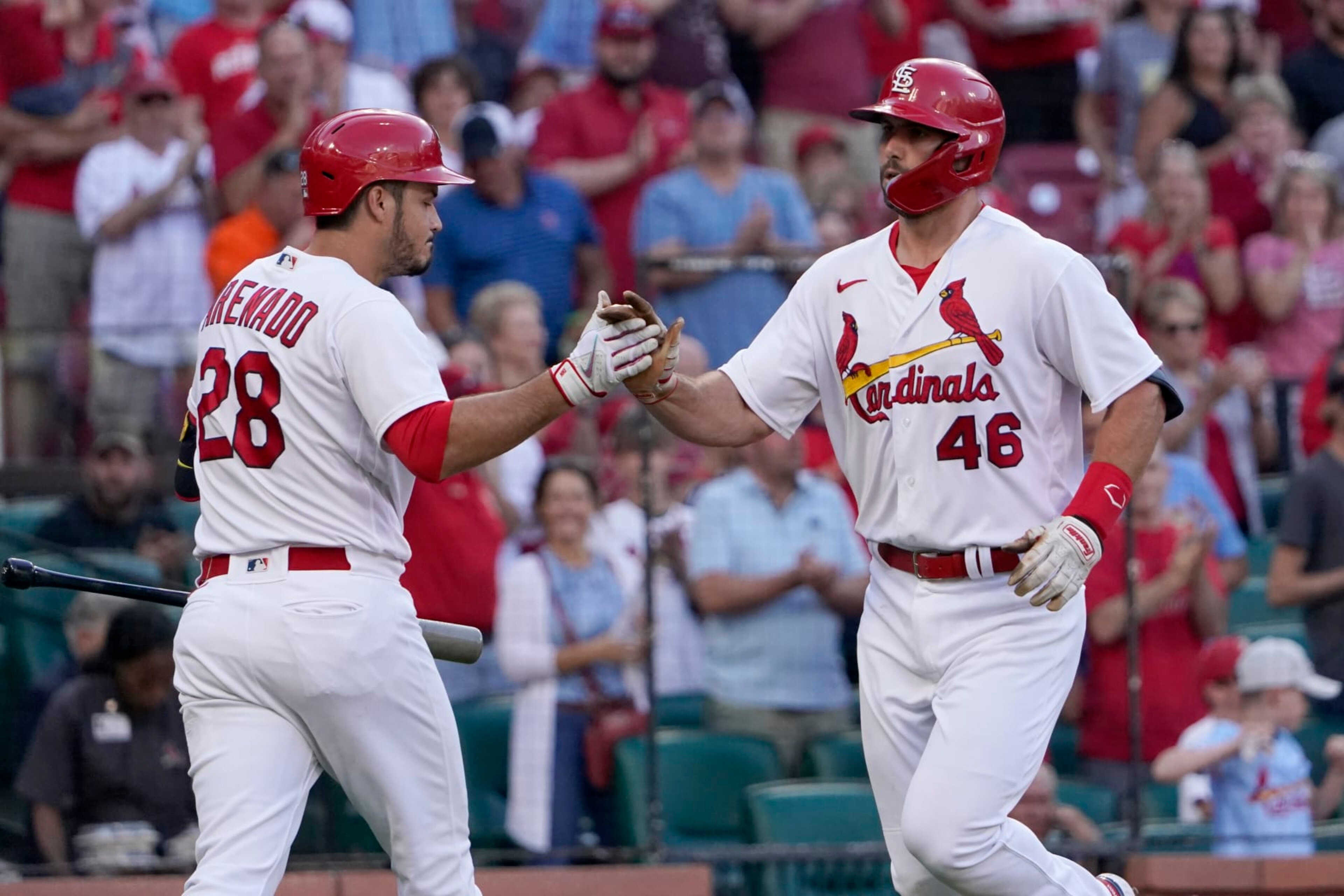 St. Louis Cardinals' Paul Goldschmidt (46) is congratulated by teammate Nolan Arenado (28) after hitting a solo home run during the first inning of a baseball game against the Miami Marlins Monday, June 27, 2022, in St. Louis. (AP Photo/Jeff Roberson) St. Louis Cardinals' Paul Goldschmidt (46) is congratulated by teammate Nolan Arenado (28) after hitting a solo home run during the first inning of a baseball game against the Miami Marlins Monday, June 27, 2022, in St. Louis. (AP Photo/Jeff Roberson)