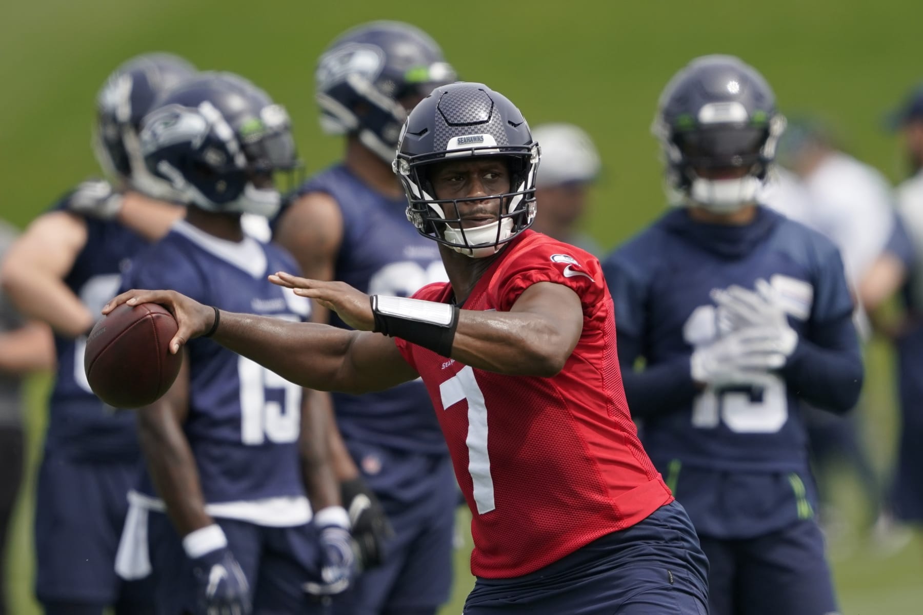 Seattle Seahawks quarterback Geno Smith passes during NFL football practice Wednesday, June 8, 2022, in Renton, Wash. (AP Photo/Ted S. Warren)