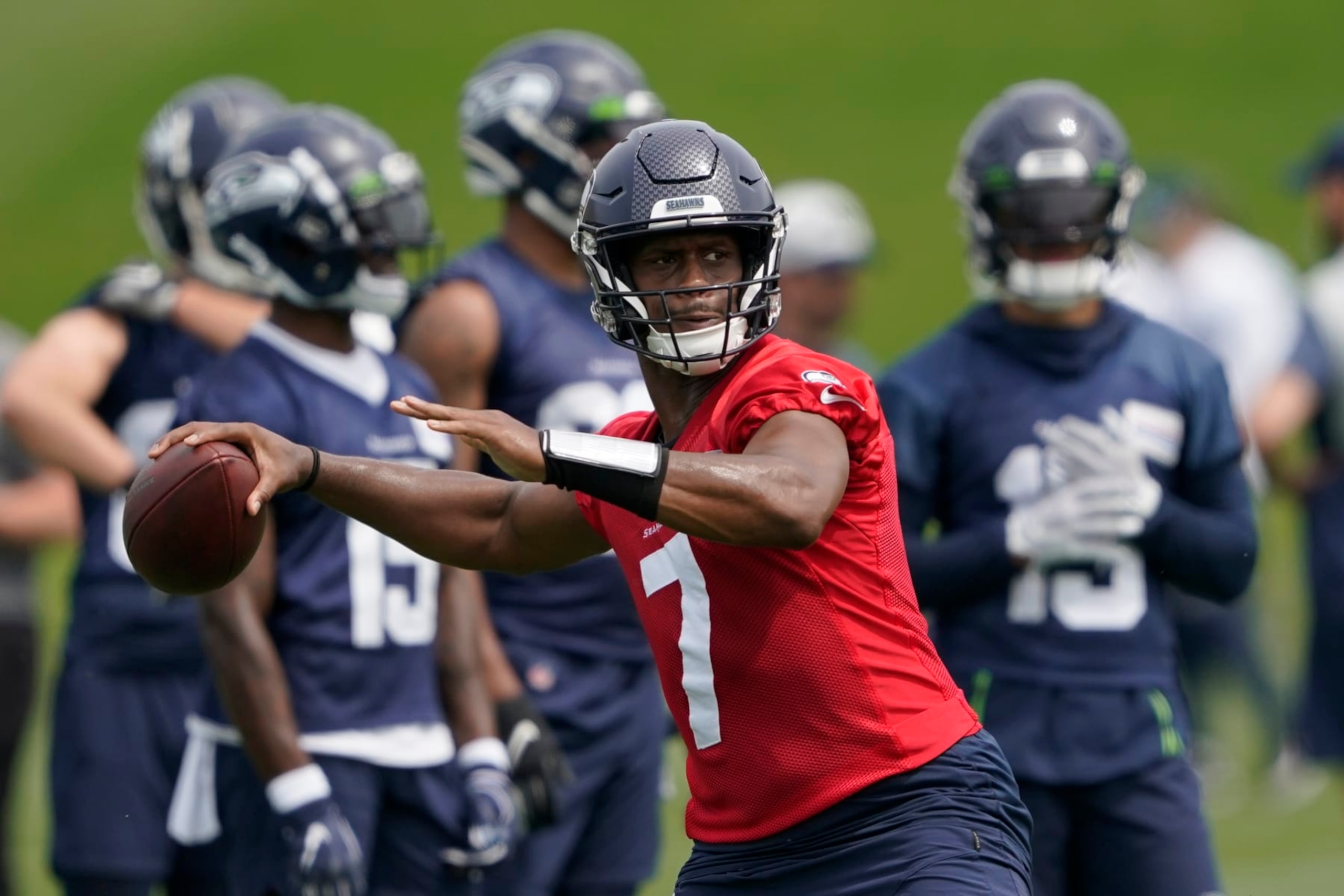 Seattle Seahawks quarterback Geno Smith passes during NFL football practice Wednesday, June 8, 2022, in Renton, Wash. (AP Photo/Ted S. Warren)