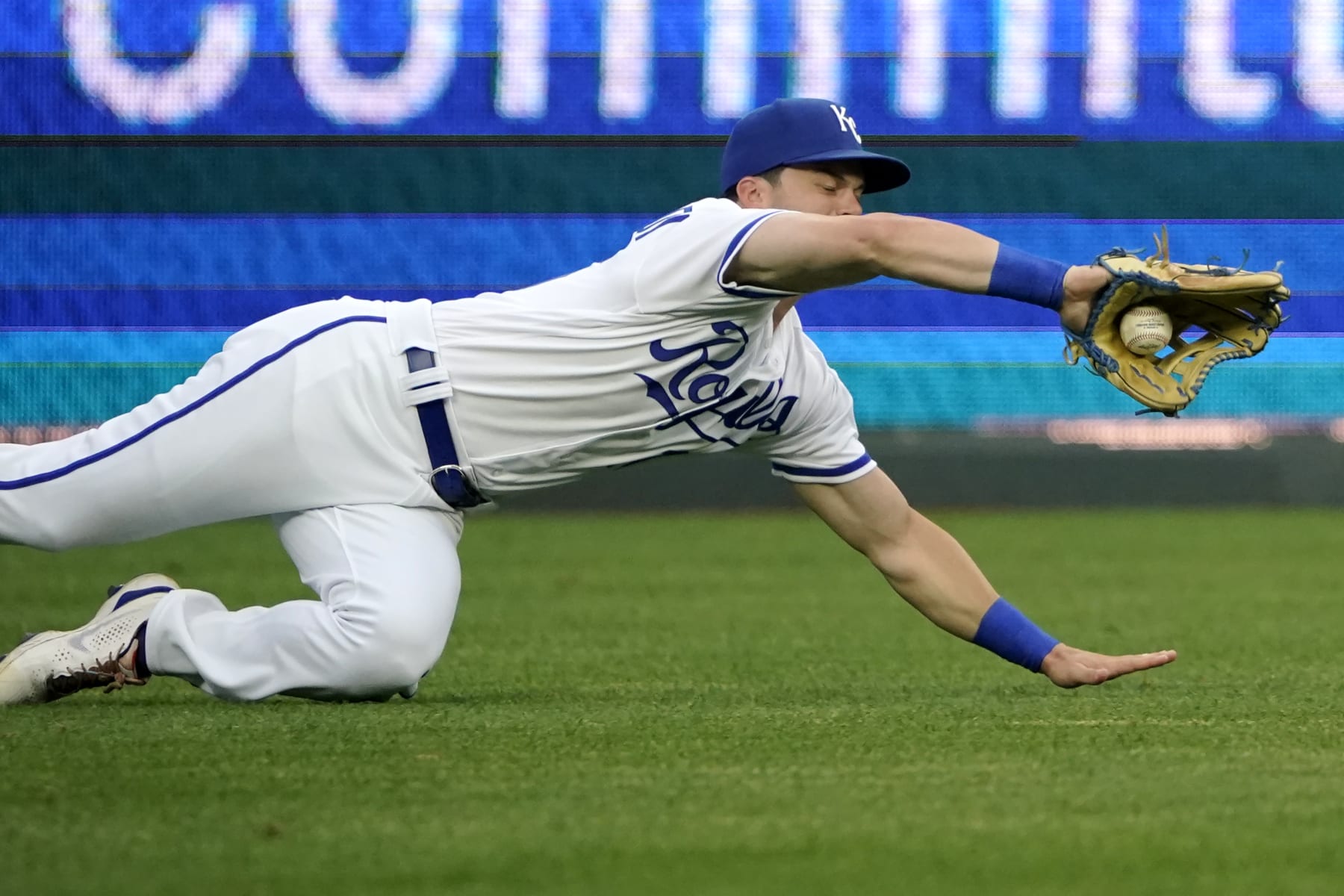 KANSAS CITY, MO - JULY 26: Andrew Benintendi #16 of the Kansas City Royals catches a ball hit by Taylor Ward of the Los Angeles Angels in the first inning at Kauffman Stadium on July 26, 2022, in Kansas City, Missouri. (Photo by Ed Zurga/Getty Images)