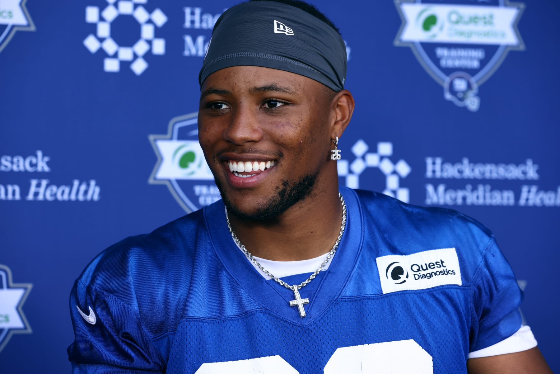 EAST RUTHERFORD, NJ - JUNE 08: Running back Saquon Barkley #26 of the New York Giants talks to the media after mandatory minicamp at Quest Diagnostics Training Center on June 8, 2022 in East Rutherford, New Jersey. (Photo by Rich Schultz/Getty Images)