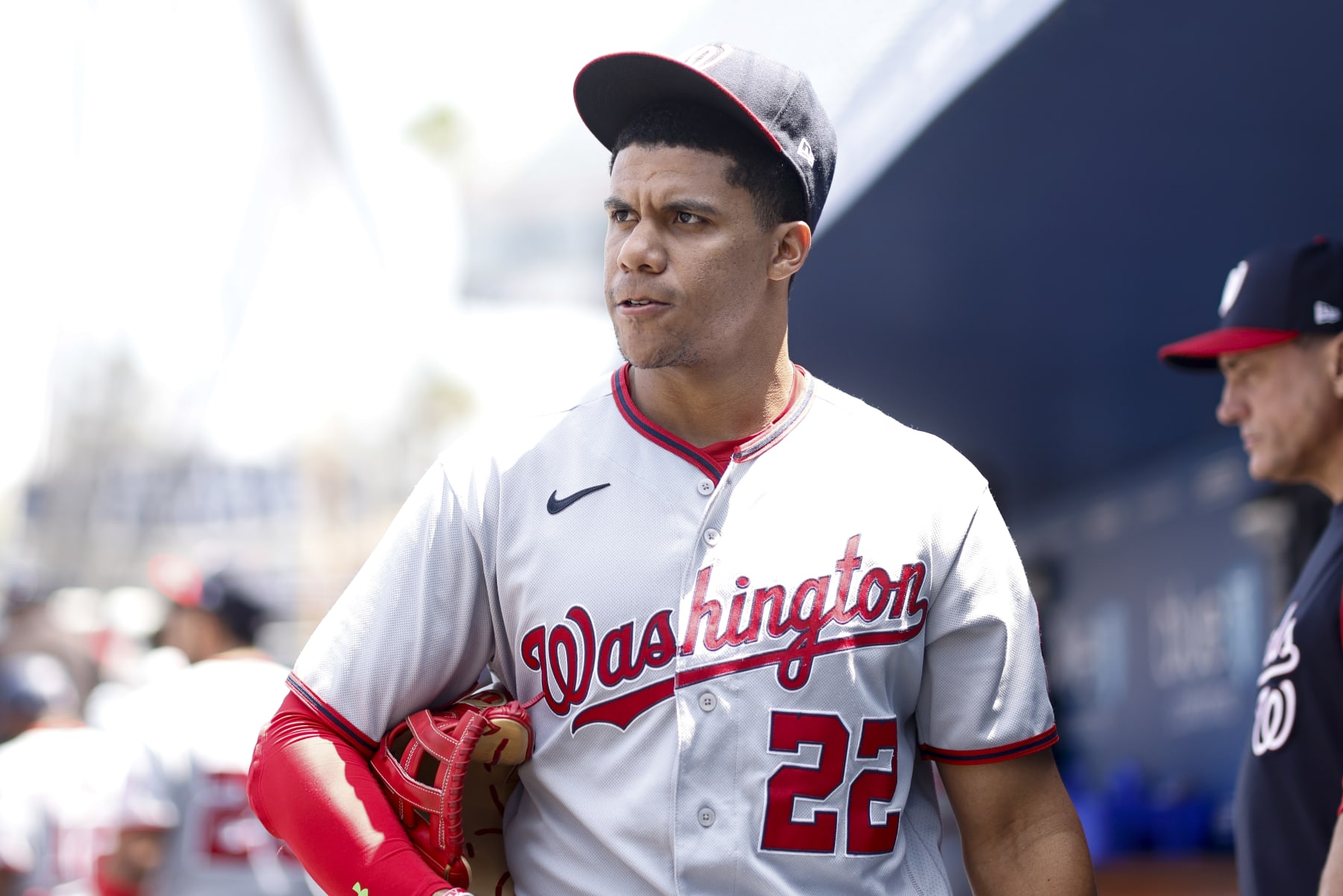 LOS ANGELES, CALIFORNIA - JULY 27: Juan Soto #22 of the Washington Nationals looks on from the dugout prior to a game against the Los Angeles Dodgers at Dodger Stadium on July 27, 2022 in Los Angeles, California. (Photo by Michael Owens/Getty Images)