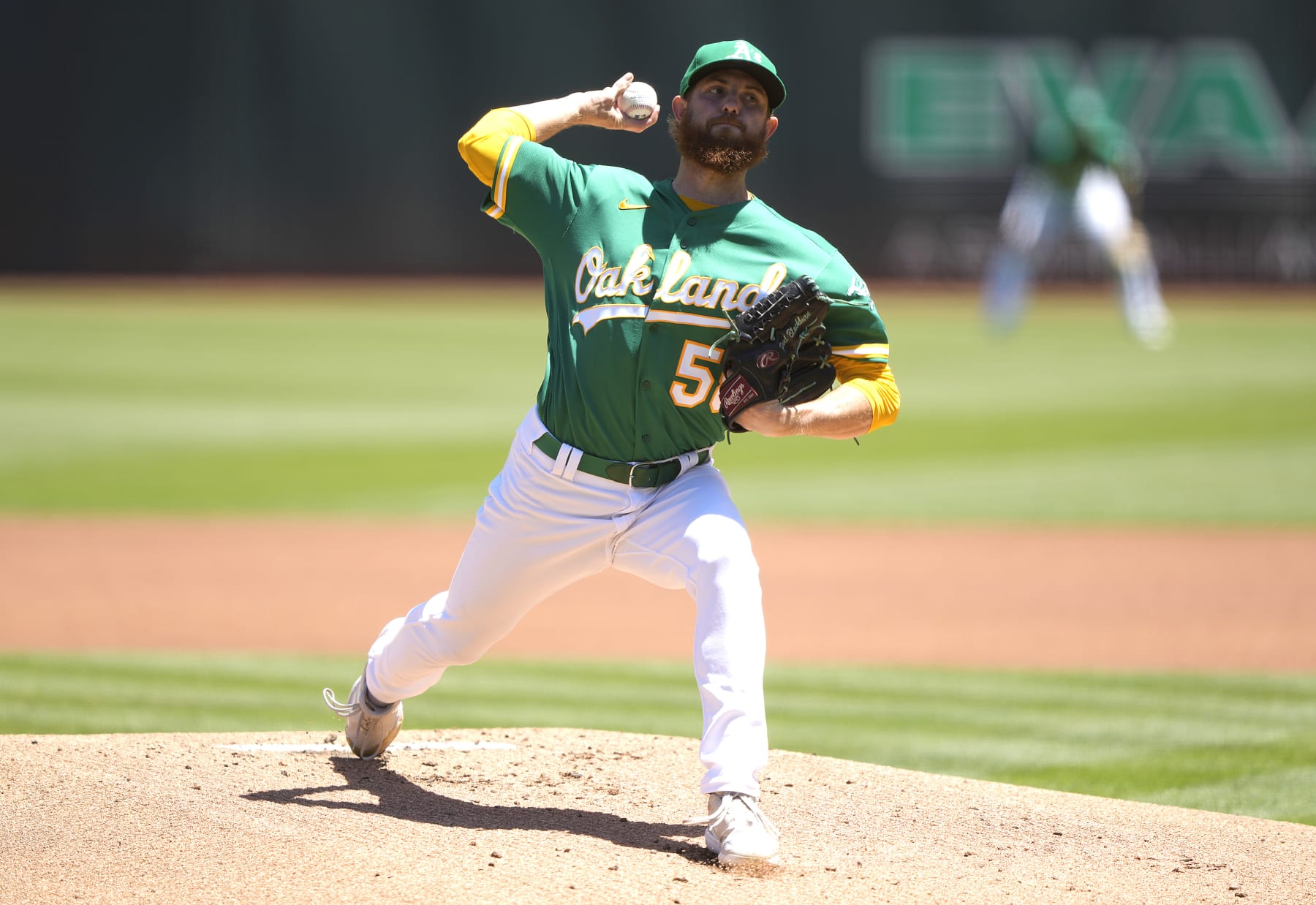 OAKLAND, CALIFORNIA - JULY 24: Paul Blackburn #58 of the Oakland Athletics pitches against the Texas Rangers in the top of the first inning at RingCentral Coliseum on July 24, 2022 in Oakland, California. (Photo by Thearon W. Henderson/Getty Images)