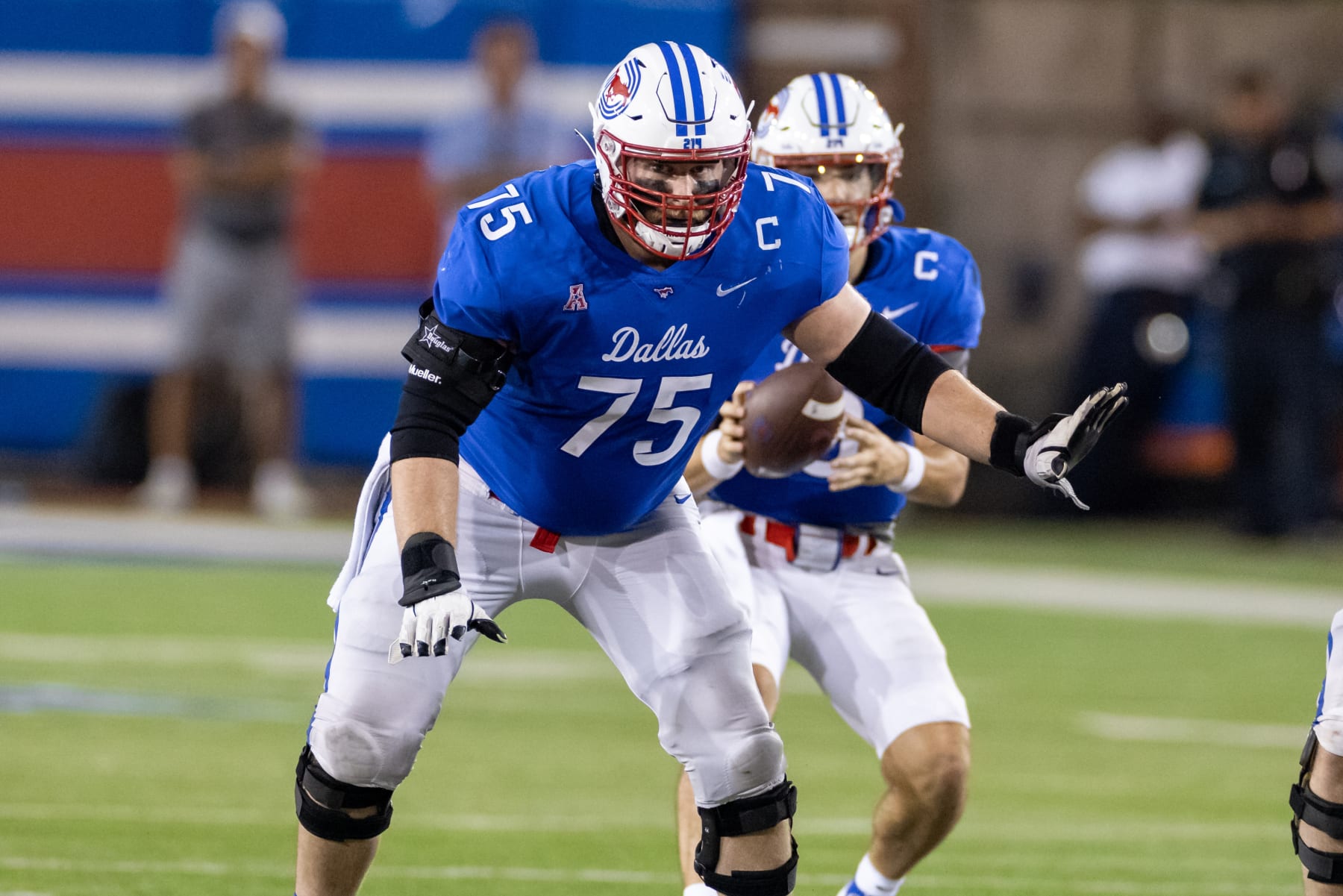 DALLAS, TX - SEPTEMBER 11: SMU Mustangs offensive lineman Hayden Howerton (#75) drops back to block during the college football game between the SMU Mustangs and North Texas Mean Green on September 11, 2021, at Gerald J. Ford Stadium in Dallas, TX.  (Photo by Matthew Visinsky/Icon Sportswire via Getty Images)
