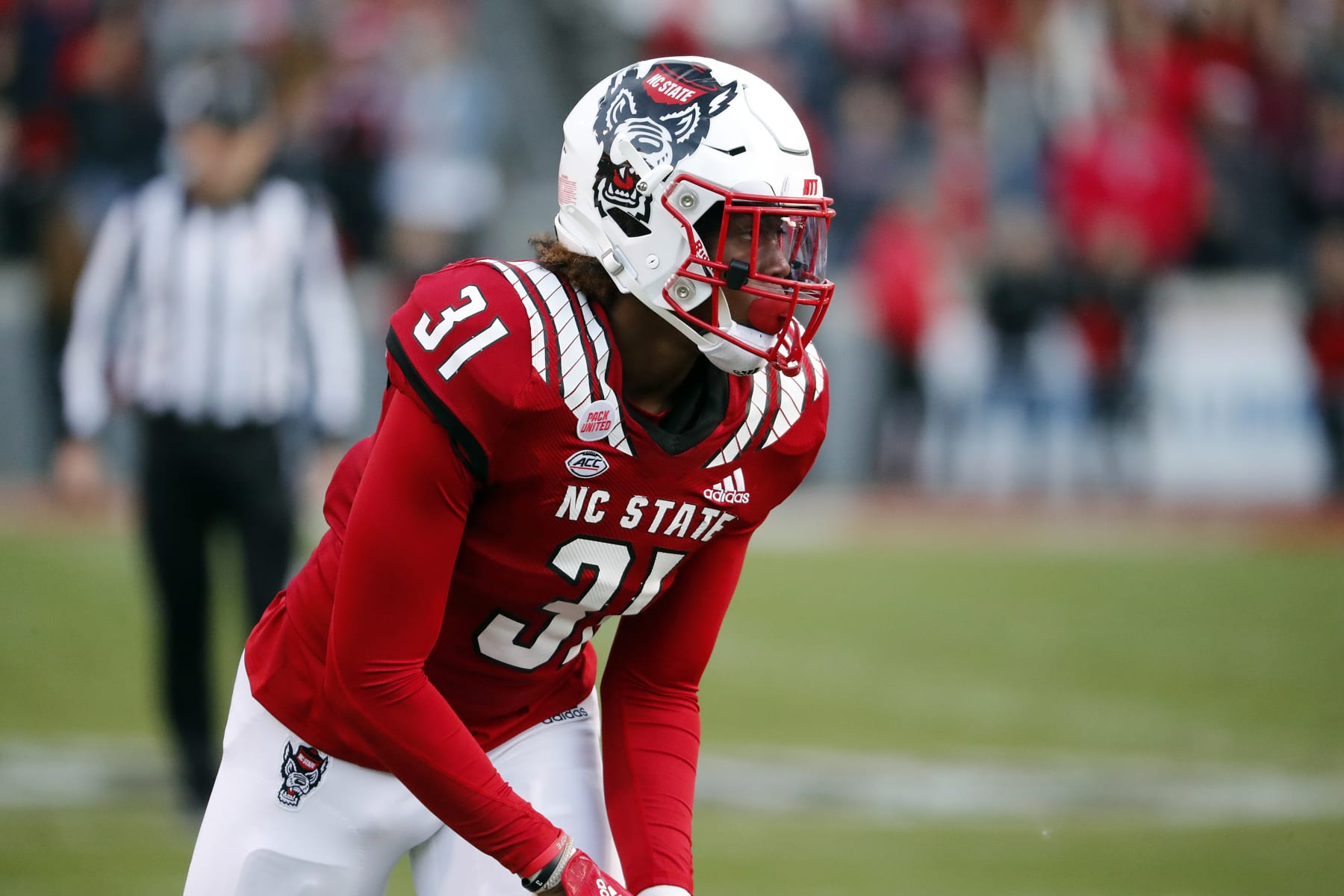 North Carolina State's Vi Jones (31) sizes up the play against Syracuse during the first half of an NCAA college football game in Raleigh, N.C., Saturday, Nov. 20, 2021. (AP Photo/Karl B DeBlaker)