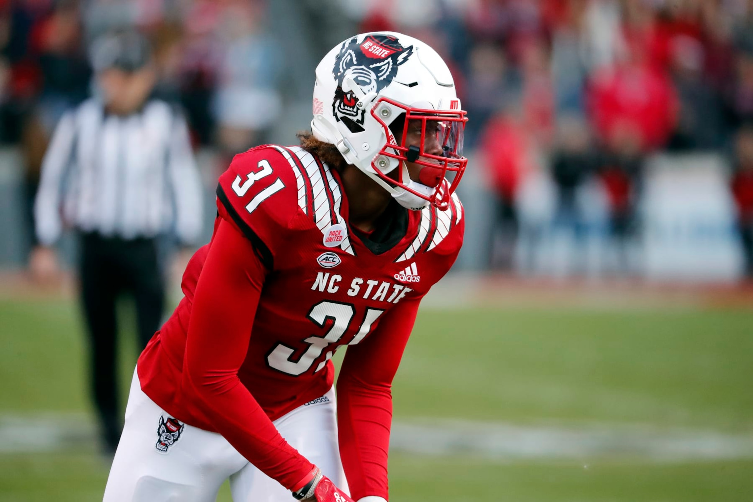 North Carolina State's Vi Jones (31) sizes up the play against Syracuse during the first half of an NCAA college football game in Raleigh, N.C., Saturday, Nov. 20, 2021. (AP Photo/Karl B DeBlaker)