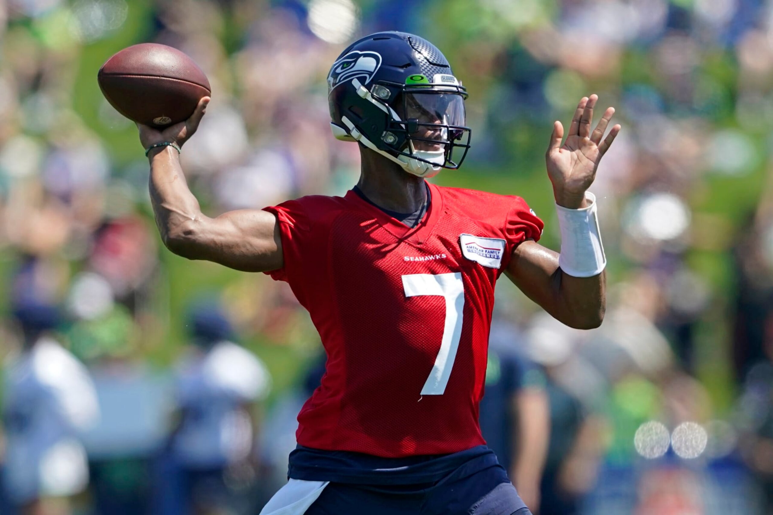 Seattle Seahawks quarterback Geno Smith throws a pass during NFL football training camp Thursday, July 28, 2022, in Renton, Wash. (AP Photo/Ted S. Warren)