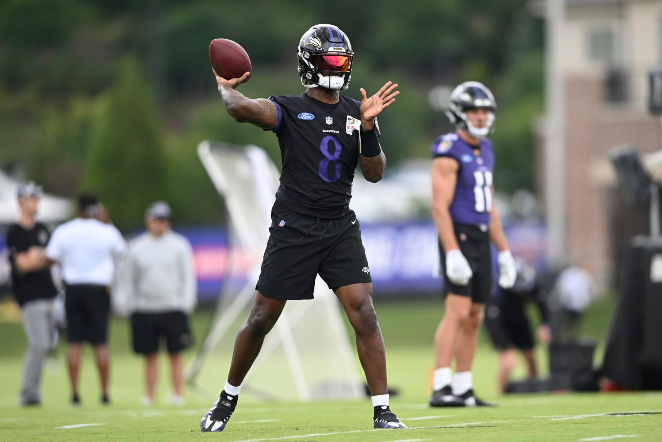 Baltimore Ravens quarterback Lamar Jackson takes part in drills at the NFL football team's training camp in Owings Mills, Md., Wednesday, July 27, 2022. (AP Photo/Gail Burton) Baltimore Ravens quarterback Lamar Jackson takes part in drills at the NFL football team's training camp in Owings Mills, Md., Wednesday, July 27, 2022. (AP Photo/Gail Burton)