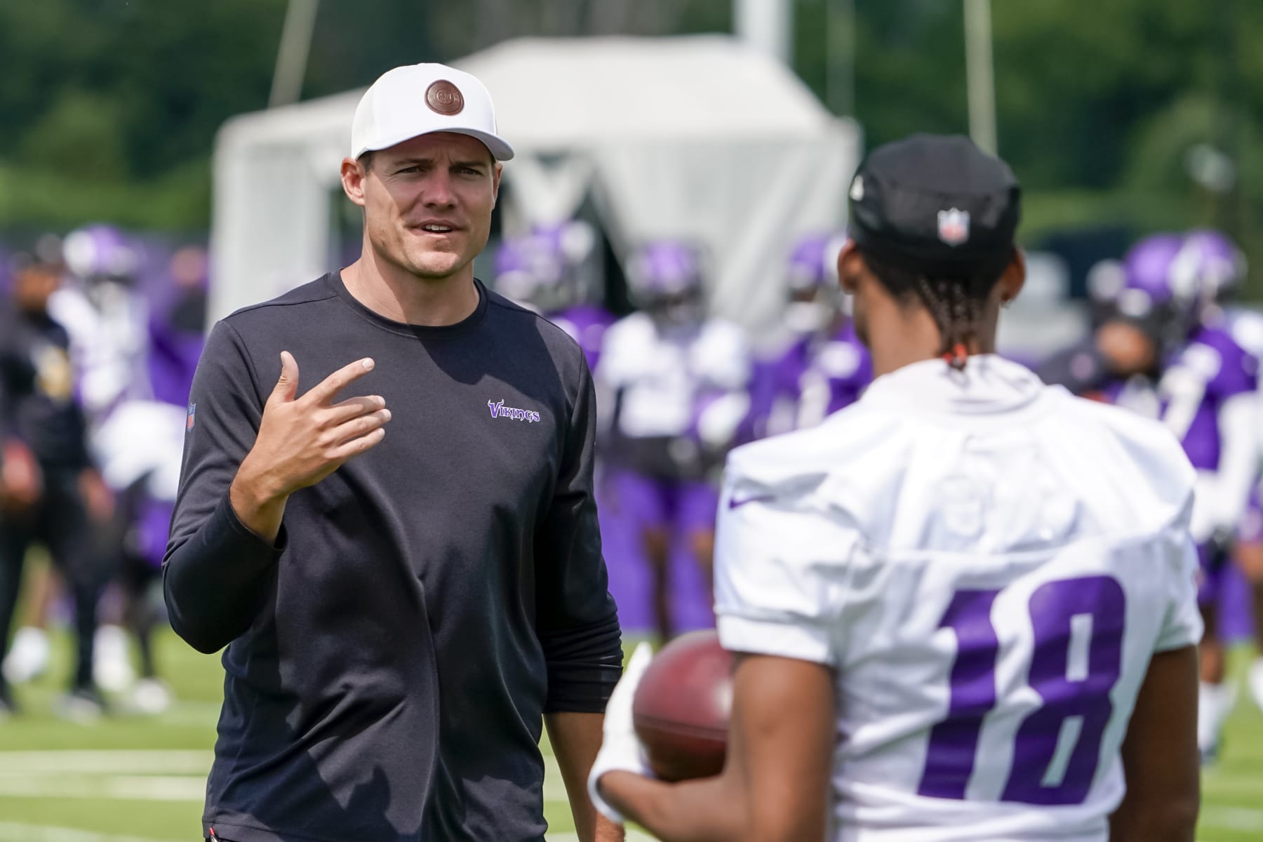 EAGAN, MN - JULY 27: Minnesota Vikings head coach Kevin O'Connell chats with Minnesota Vikings wide receiver Justin Jefferson (18) during the first day of Minnesota Vikings Training Camp at TCO Performance Center on July 27, 2022 in Eagan, Minnesota.(Photo by Nick Wosika/Icon Sportswire via Getty Images)