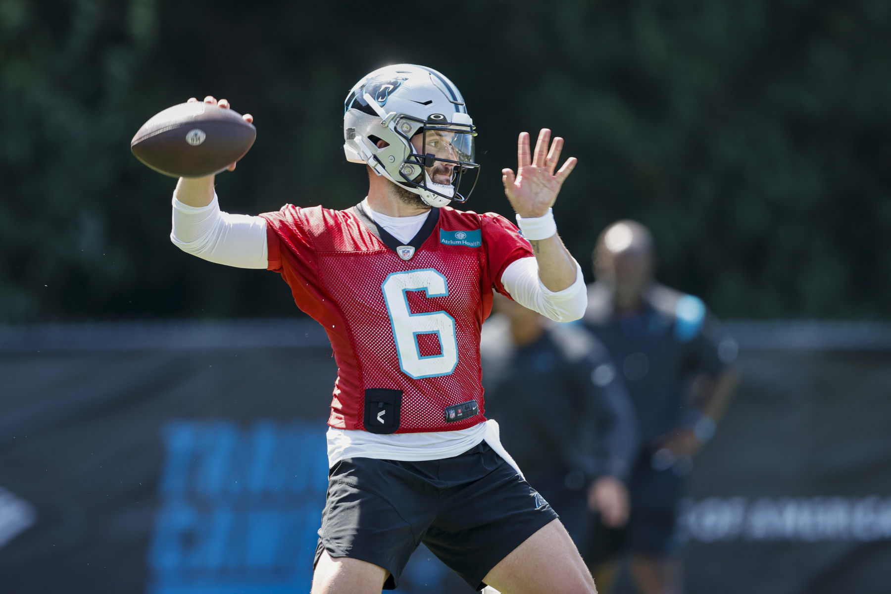 Carolina Panthers quarterback Baker Mayfield throws the football at the NFL football team's training camp at Wofford College in Spartanburg, S.C., Thursday, July 28, 2022. (AP Photo/Nell Redmond)