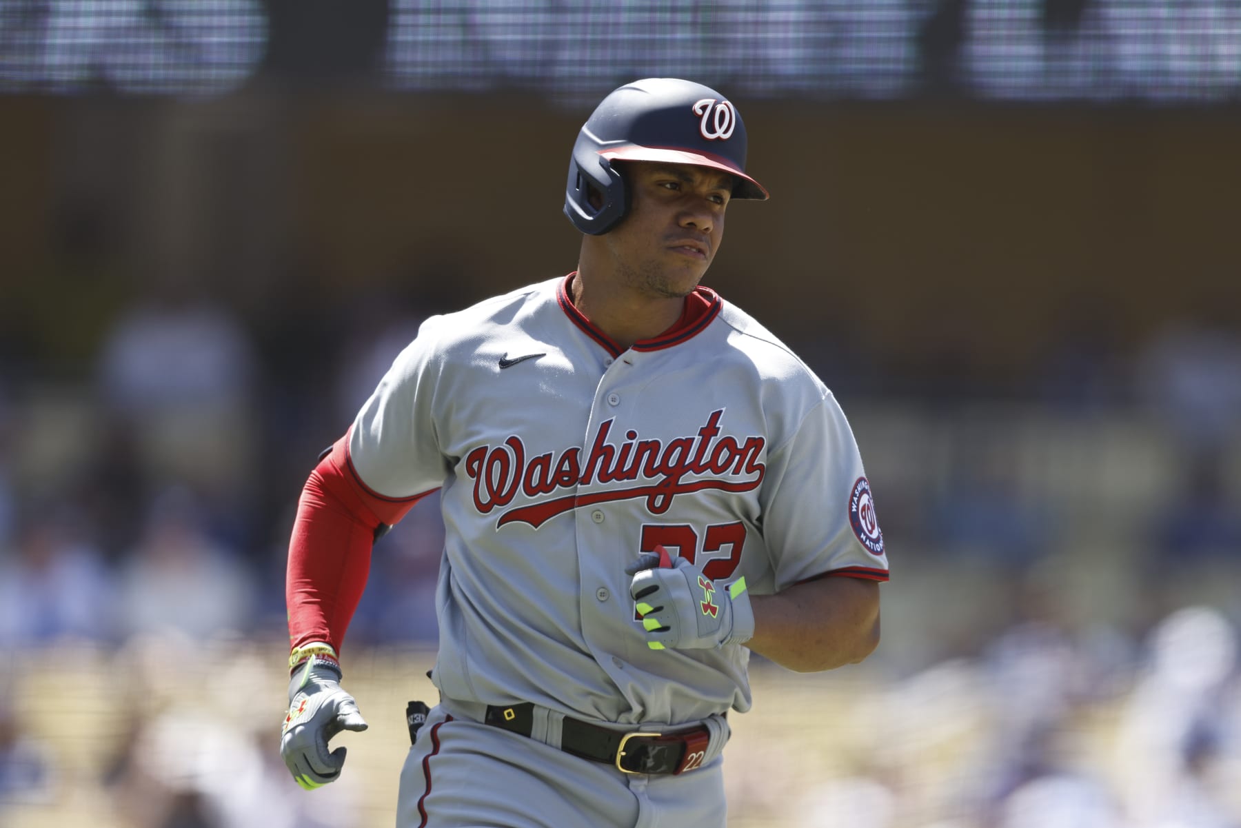 LOS ANGELES, CALIFORNIA - JULY 27: Juan Soto #22 of the Washington Nationals runs to first base against the Los Angeles Dodgers during the eighth inning at Dodger Stadium on July 27, 2022 in Los Angeles, California. (Photo by Michael Owens/Getty Images)