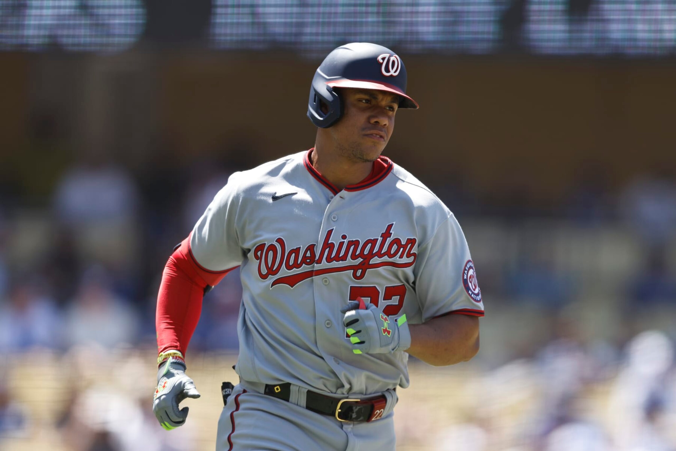 LOS ANGELES, CALIFORNIA - JULY 27: Juan Soto #22 of the Washington Nationals runs to first base against the Los Angeles Dodgers during the eighth inning at Dodger Stadium on July 27, 2022 in Los Angeles, California. (Photo by Michael Owens/Getty Images)