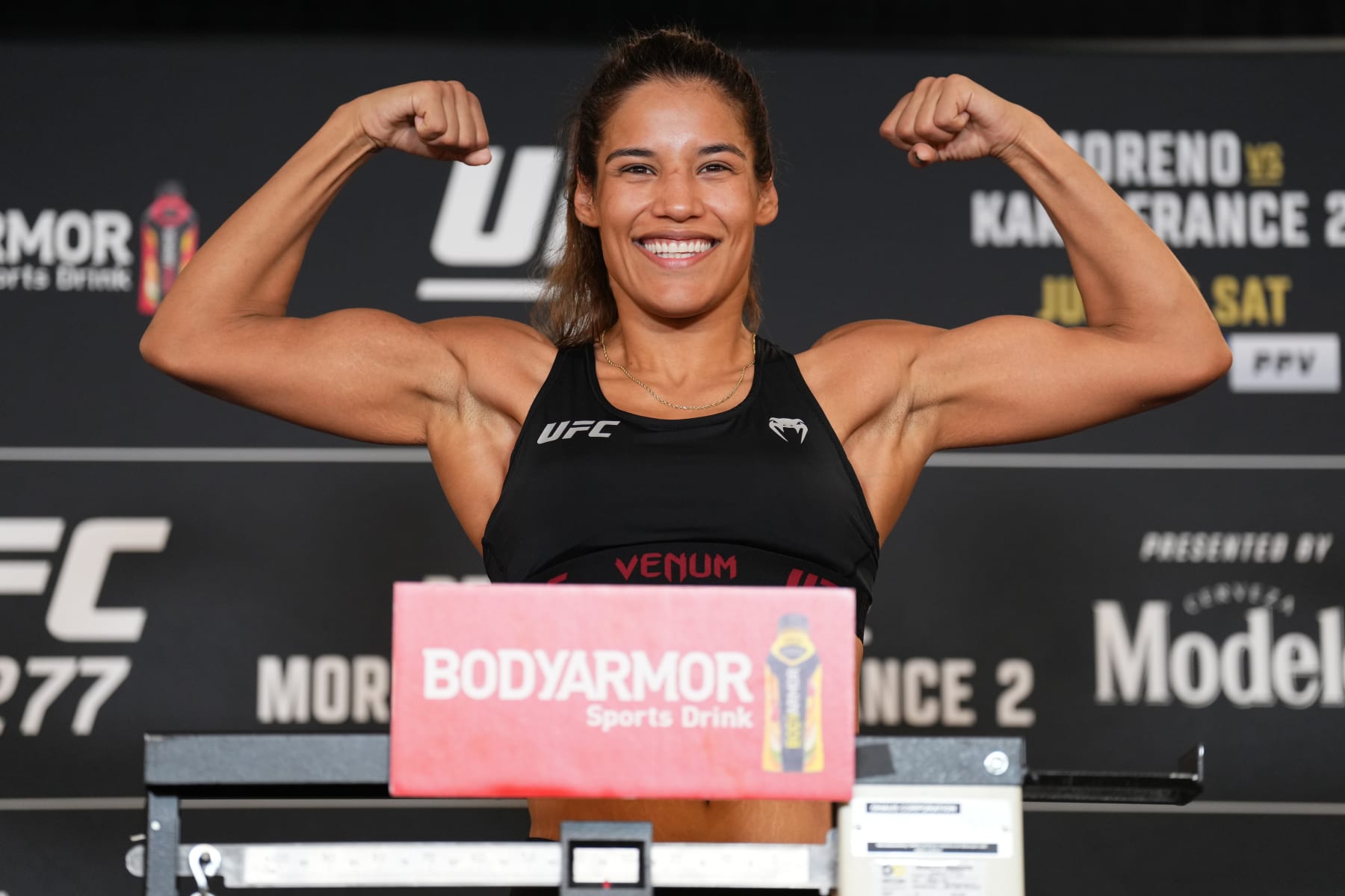 DALLAS, TEXAS - JULY 29: Julianna Pena poses on the scale during the UFC 277 official weigh-in at the Hyatt Regency hotel on July 29, 2022 in Dallas, Texas. (Photo by Chris Unger/Zuffa LLC) DALLAS, TEXAS - JULY 29: Julianna Pena poses on the scale during the UFC 277 official weigh-in at the Hyatt Regency hotel on July 29, 2022 in Dallas, Texas. (Photo by Chris Unger/Zuffa LLC)