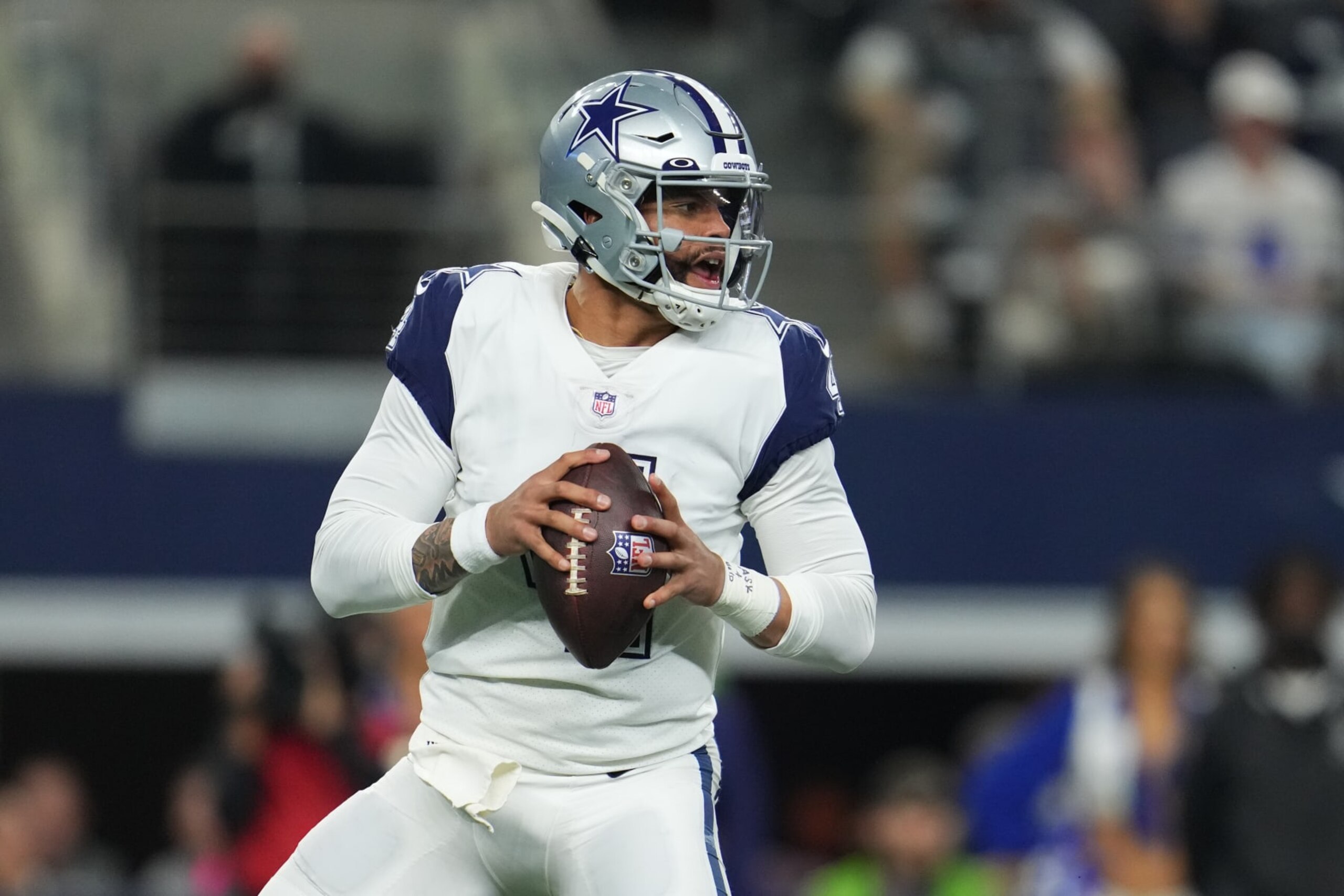 ARLINGTON, TEXAS - JANUARY 02: Dak Prescott #4 of the Dallas Cowboys drops back against the Arizona Cardinals during an NFL game at AT&T Stadium on January 02, 2022 in Arlington, Texas. (Photo by Cooper Neill/Getty Images)