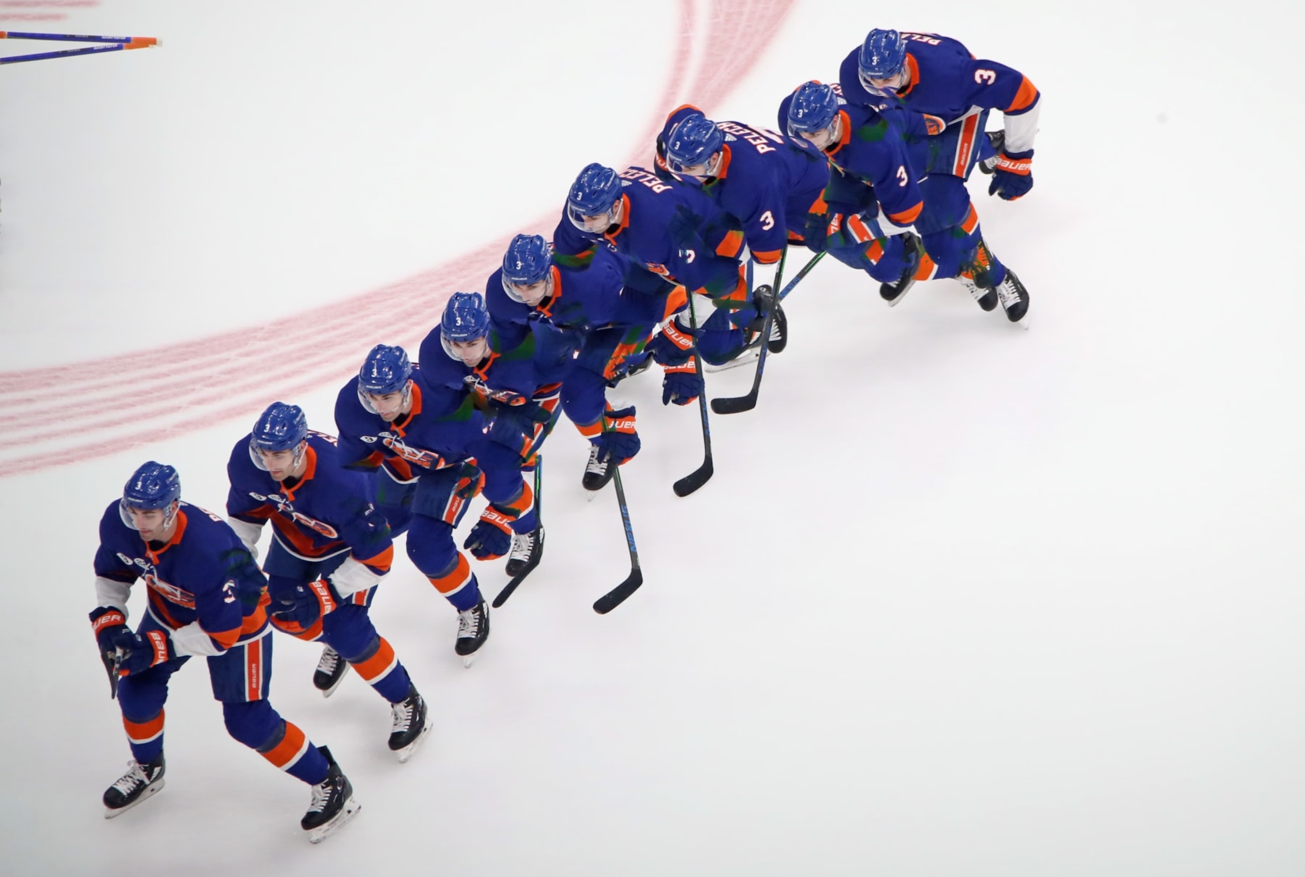 ELMONT, NEW YORK - APRIL 29: (EDITORS NOTE: This image was created using in-camera multiple exposure.) Adam Pelech #3 of the New York Islanders skates in warm-ups prior to the game against the Tampa Bay Lightning at UBS Arena on April 29, 2022 in Elmont, New York. (Photo by Bruce Bennett/Getty Images)