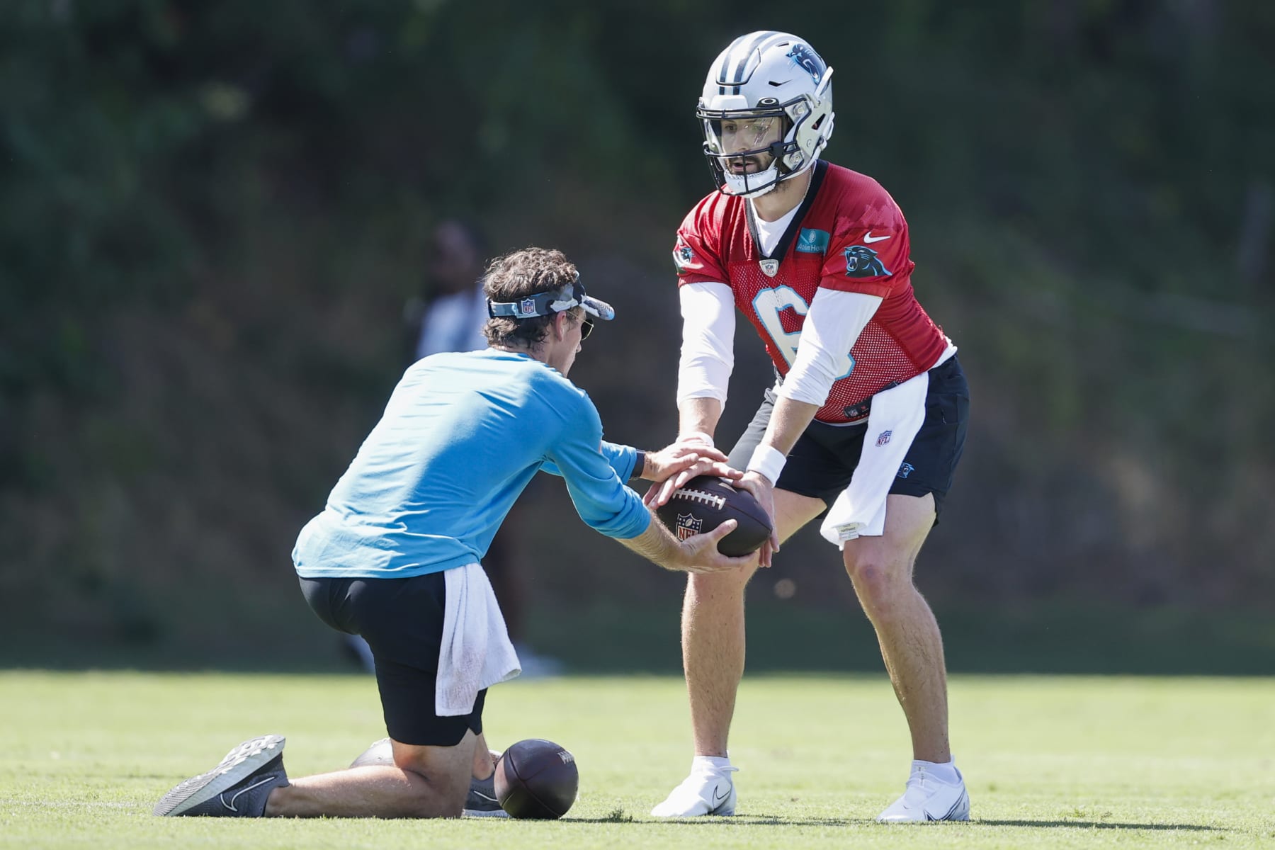 Carolina Panthers quarterback Baker Mayfield runs a drill at the NFL football team's training camp at Wofford College in Spartanburg, S.C., Thursday, July 28, 2022. (AP Photo/Nell Redmond) Carolina Panthers quarterback Baker Mayfield runs a drill at the NFL football team's training camp at Wofford College in Spartanburg, S.C., Thursday, July 28, 2022. (AP Photo/Nell Redmond)
