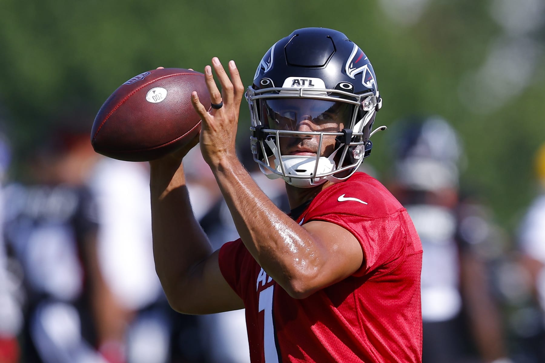 FLOWERY BRANCH, GA - JULY 28: Marcus Mariota #1 of Atlanta Falcons passes during a training camp practice on July 28, 2022 at IBM Performance Field in Flowery Branch, Georgia. (Photo by Todd Kirkland/Getty Images) FLOWERY BRANCH, GA - JULY 28: Marcus Mariota #1 of Atlanta Falcons passes during a training camp practice on July 28, 2022 at IBM Performance Field in Flowery Branch, Georgia. (Photo by Todd Kirkland/Getty Images)