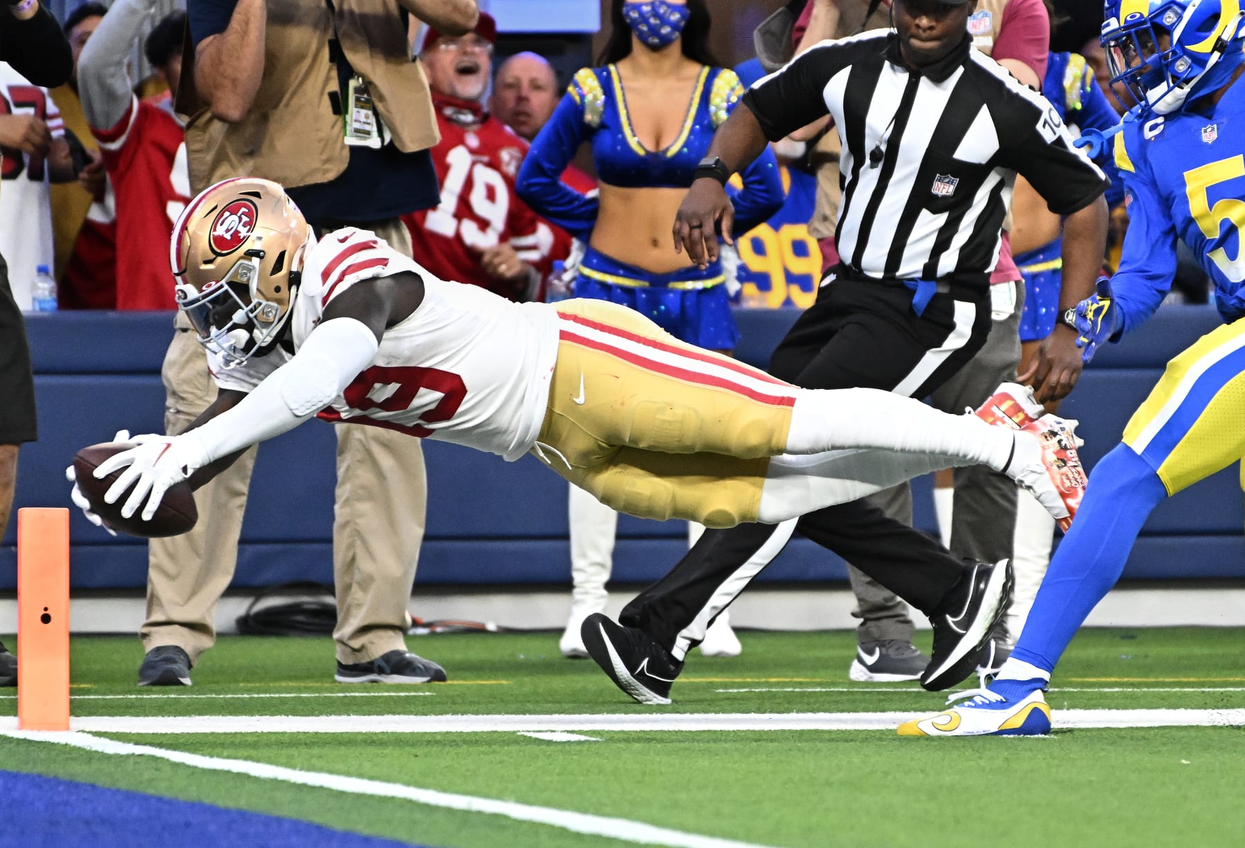 Inglewood, California January 30, 2022: 49ers receiver Deebo Samuel dives for the end zone to beat Rams cornerback Jalen Ramsey for a touchdown in the second quarter in the NFC Championship at SoFi Stadium in Inglewood Sunday. (Wally Skalij/Los Angeles Times via Getty Images)