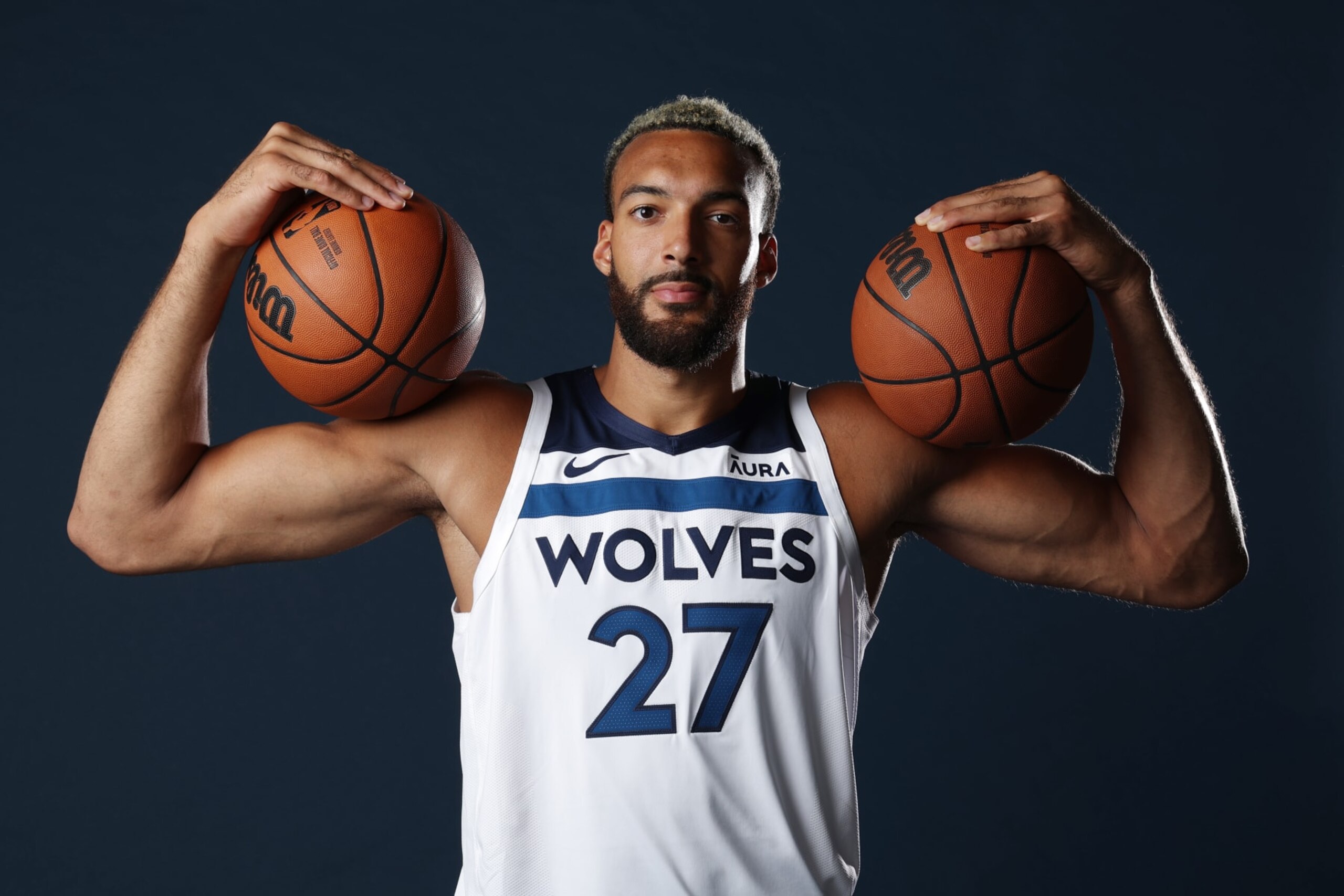 MINNEAPOLIS, MN - JULY 6: Rudy Gobert of the Minnesota Timberwolves poses for a portrait on July 6, 2022 at Target Center in Minneapolis, Minnesota. NOTE TO USER: User expressly acknowledges and agrees that, by downloading and or using this Photograph, user is consenting to the terms and conditions of the Getty Images License Agreement. Mandatory Copyright Notice: Copyright 2022 NBAE (Photo by David Sherman/NBAE via Getty Images) MINNEAPOLIS, MN - JULY 6: Rudy Gobert of the Minnesota Timberwolves poses for a portrait on July 6, 2022 at Target Center in Minneapolis, Minnesota. NOTE TO USER: User expressly acknowledges and agrees that, by downloading and or using this Photograph, user is consenting to the terms and conditions of the Getty Images License Agreement. Mandatory Copyright Notice: Copyright 2022 NBAE (Photo by David Sherman/NBAE via Getty Images)