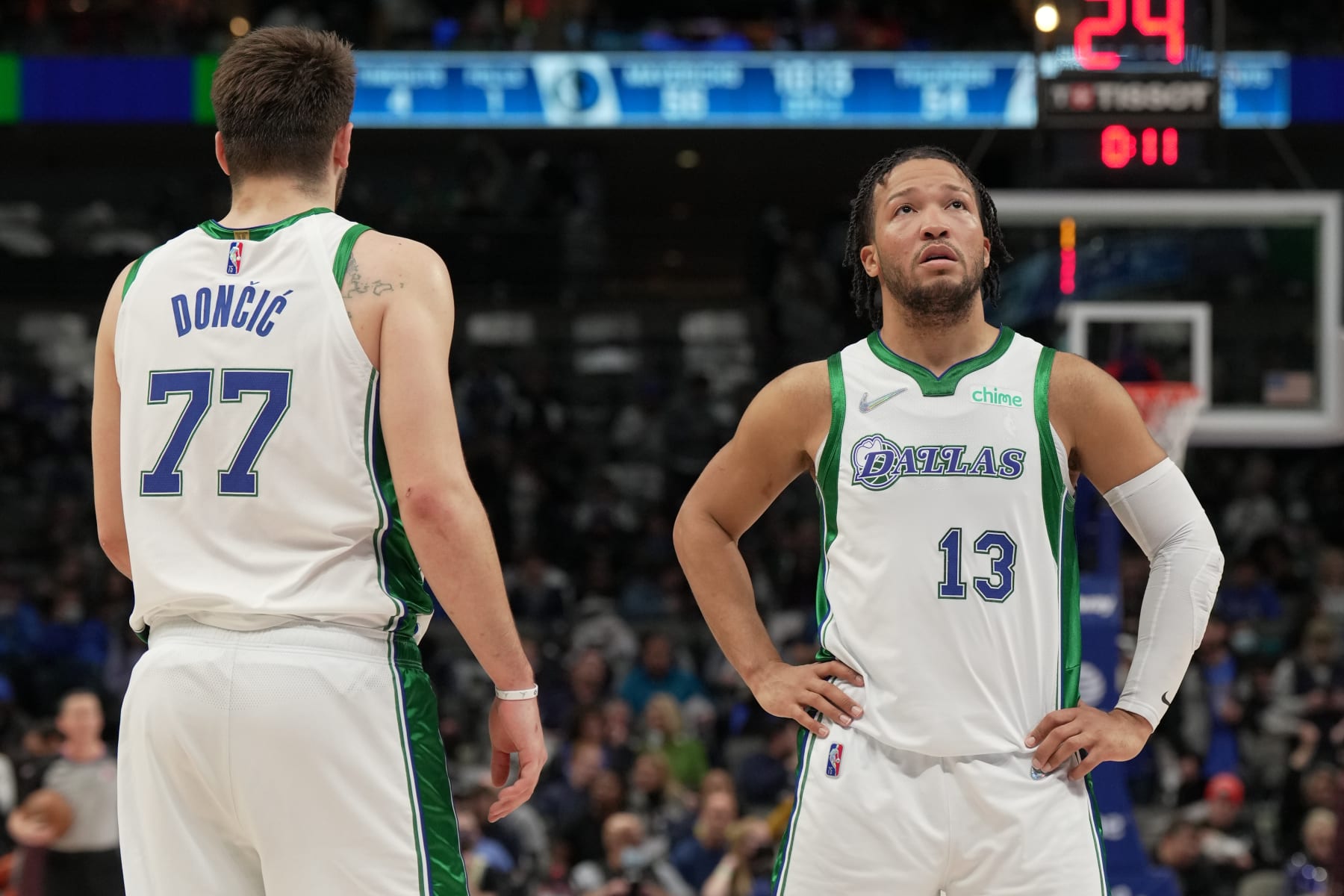 DALLAS, TX - FEBRUARY 2: Luka Doncic #77 and Jalen Brunson #13 of the Dallas Mavericks look on during the game against the Oklahoma City Thunder on February 2, 2022 at the American Airlines Center in Dallas, Texas. NOTE TO USER: User expressly acknowledges and agrees that, by downloading and or using this photograph, User is consenting to the terms and conditions of the Getty Images License Agreement. Mandatory Copyright Notice: Copyright 2022 NBAE (Photo by Glenn James/NBAE via Getty Images)