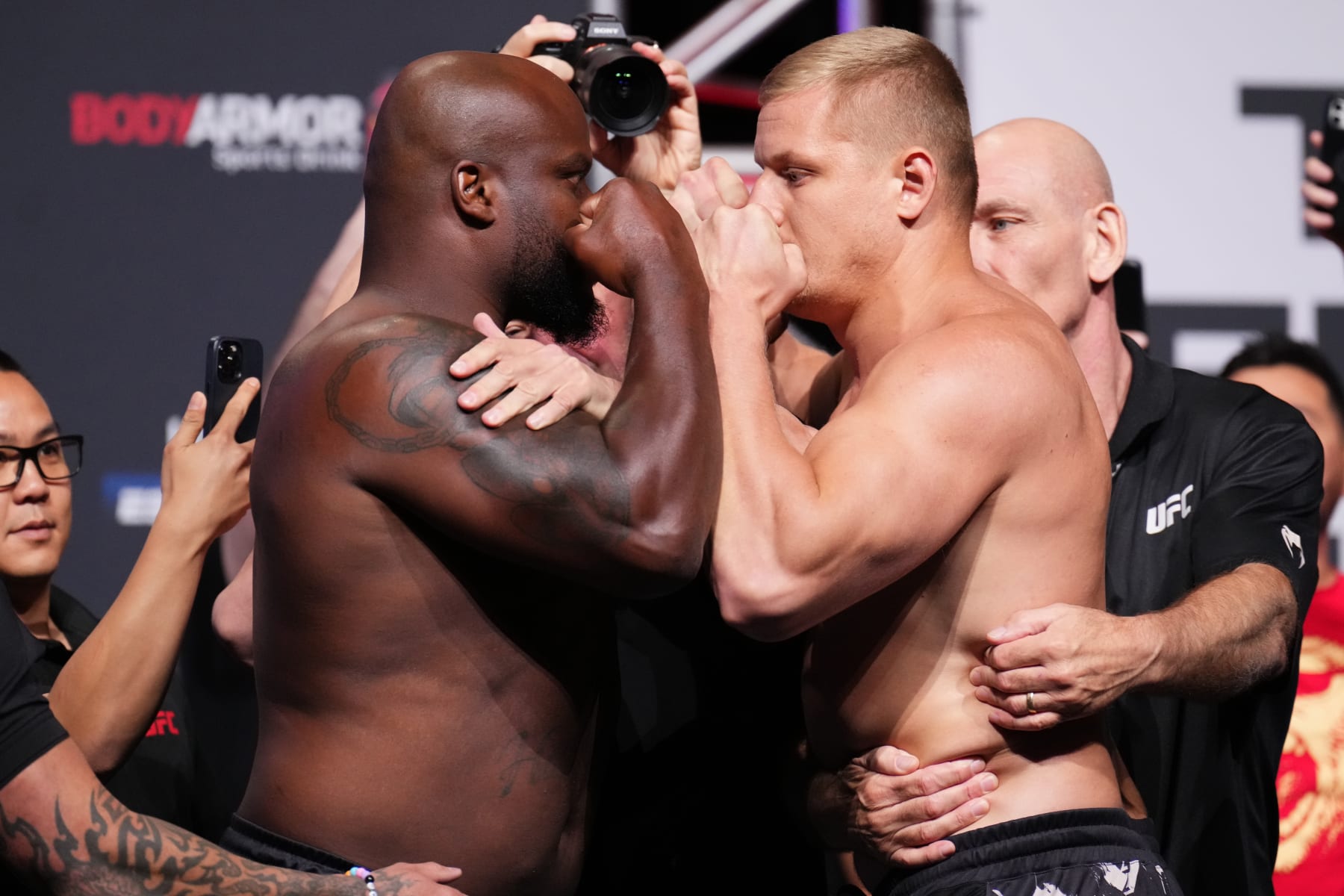 DALLAS, TEXAS - JULY 29: (L-R) Derrick Lewis and Sergei Pavlovich of Russia face off during the UFC 277 ceremonial weigh-in at American Airlines Center on July 29, 2022 in Dallas, Texas. (Photo by Josh Hedges/Zuffa LLC)