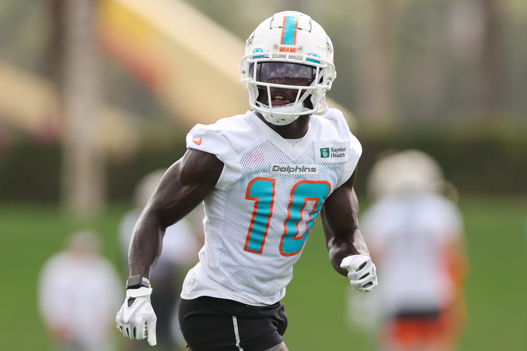 MIAMI GARDENS, FLORIDA - JULY 27: Tyreek Hill #10 of the Miami Dolphins catches a pass during training camp at Baptist Health Training Complex on July 27, 2022 in Miami Gardens, Florida. (Photo by Michael Reaves/Getty Images)