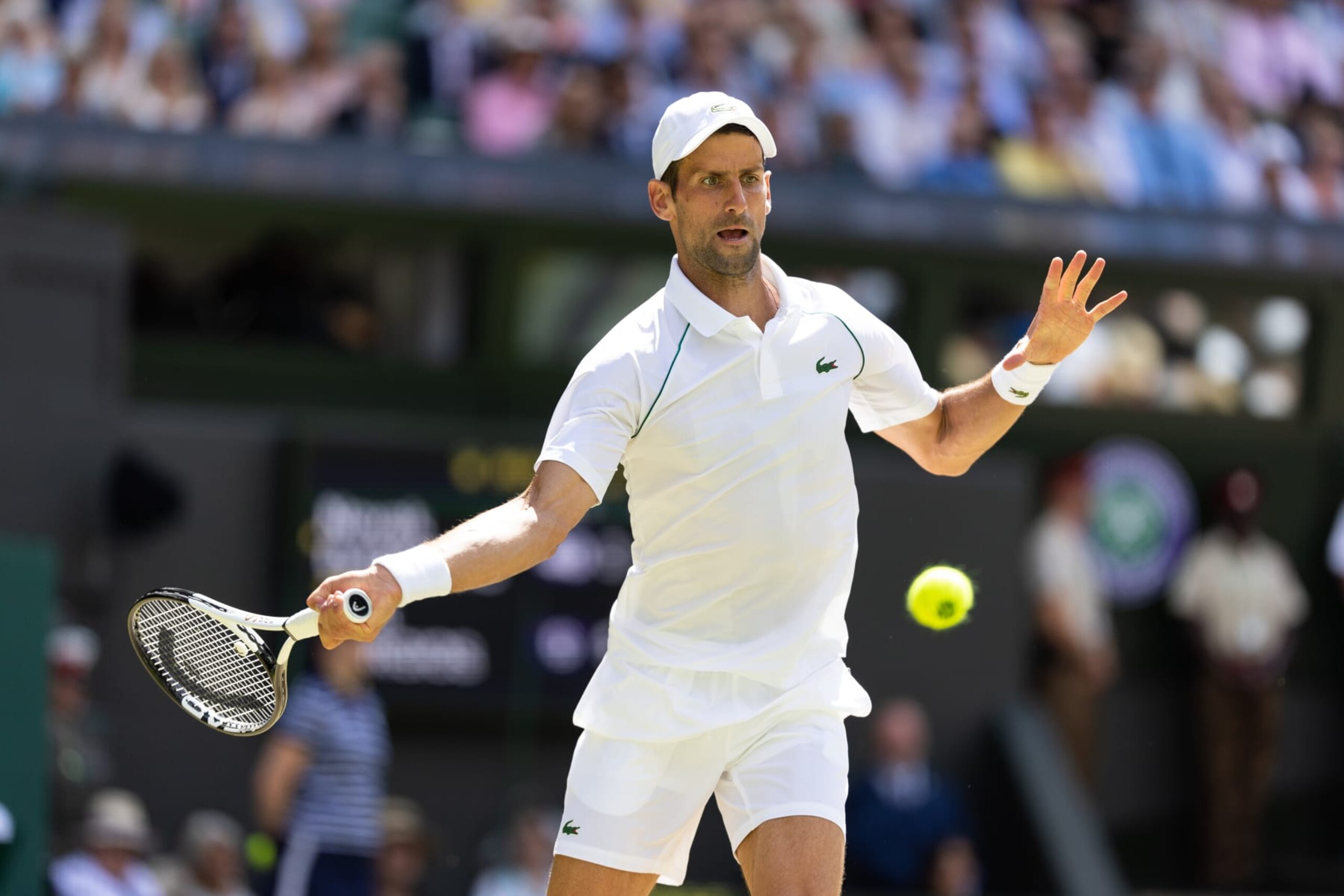 LONDON, ENGLAND - JULY 10: Novak Djokovic of Serbia in action during the Mens Singles Final against Nick Kyrgios of Australia (not pictured) at The Wimbledon Lawn Tennis Championship at the All England Lawn and Tennis Club at Wimbledon on July 10, 2022 in London, England. (Photo by Simon Bruty/Anychance/Getty Images) LONDON, ENGLAND - JULY 10: Novak Djokovic of Serbia in action during the Mens Singles Final against Nick Kyrgios of Australia (not pictured) at The Wimbledon Lawn Tennis Championship at the All England Lawn and Tennis Club at Wimbledon on July 10, 2022 in London, England. (Photo by Simon Bruty/Anychance/Getty Images)