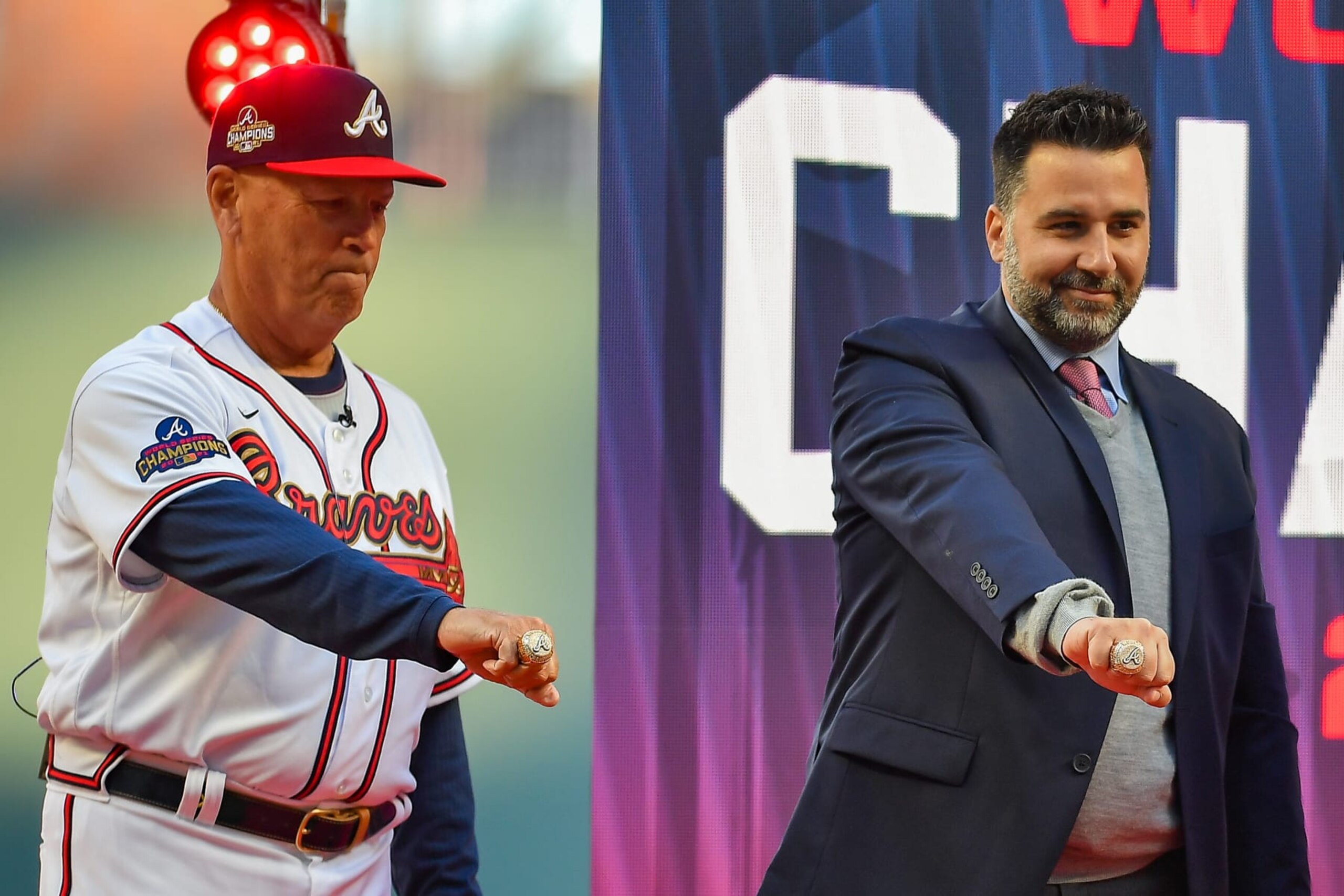 ATLANTA, GA  APRIL 09:  Atlanta manager Brian Snitker (43) and general manager Alex Anthopoulos show off their World Series rings prior to the start of the MLB game between the Cincinnati Reds and the Atlanta Braves on April 9th, 2022 at Truist Park in Atlanta, GA. (Photo by Rich von Biberstein/Icon Sportswire via Getty Images)