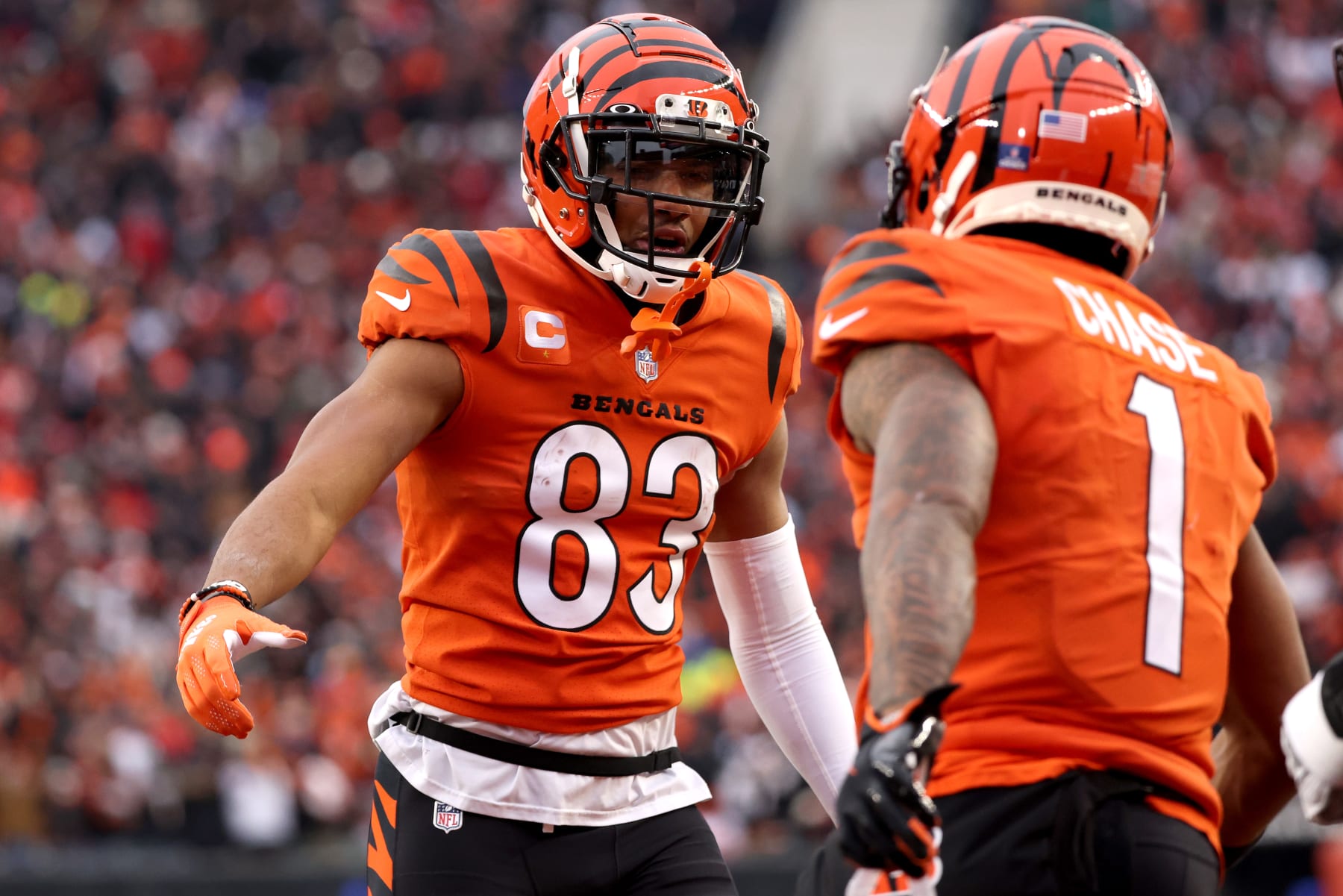 CINCINNATI, OHIO - JANUARY 02: Tyler Boyd #83 of the Cincinnati Bengals celebrates with Ja'Marr Chase #1 after a touchdown in the fourth quarter of the game against the Kansas City Chiefs at Paul Brown Stadium on January 02, 2022 in Cincinnati, Ohio. (Photo by Dylan Buell/Getty Images)