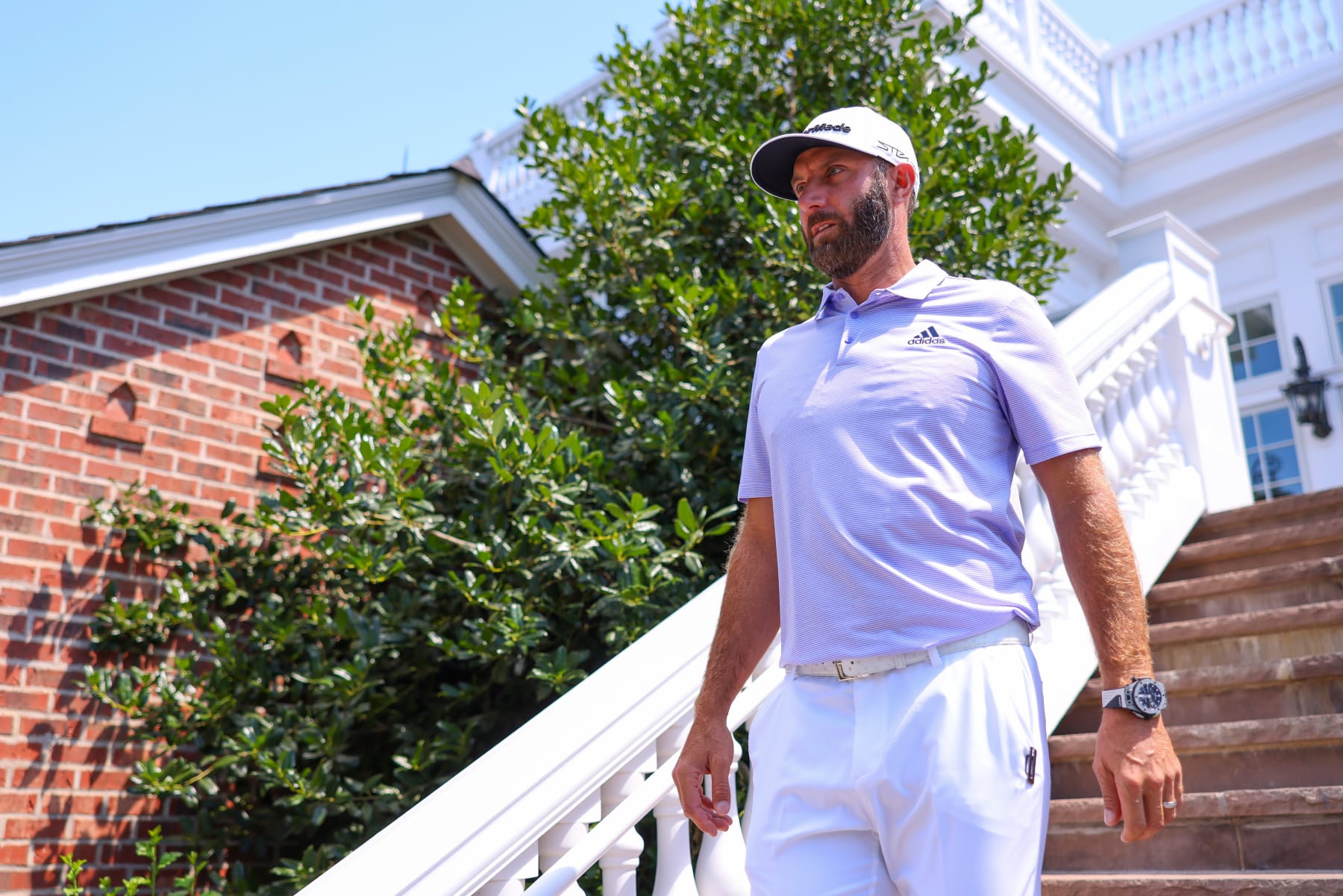 BEDMINSTER, NEW JERSEY - JULY 30: Team Captain Dustin Johnson of 4 Aces GC walks to the course during day two of the LIV Golf Invitational - Bedminster at Trump National Golf Club Bedminster on July 30, 2022 in Bedminster, New Jersey. (Photo by Chris Trotman/LIV Golf via Getty Images)
