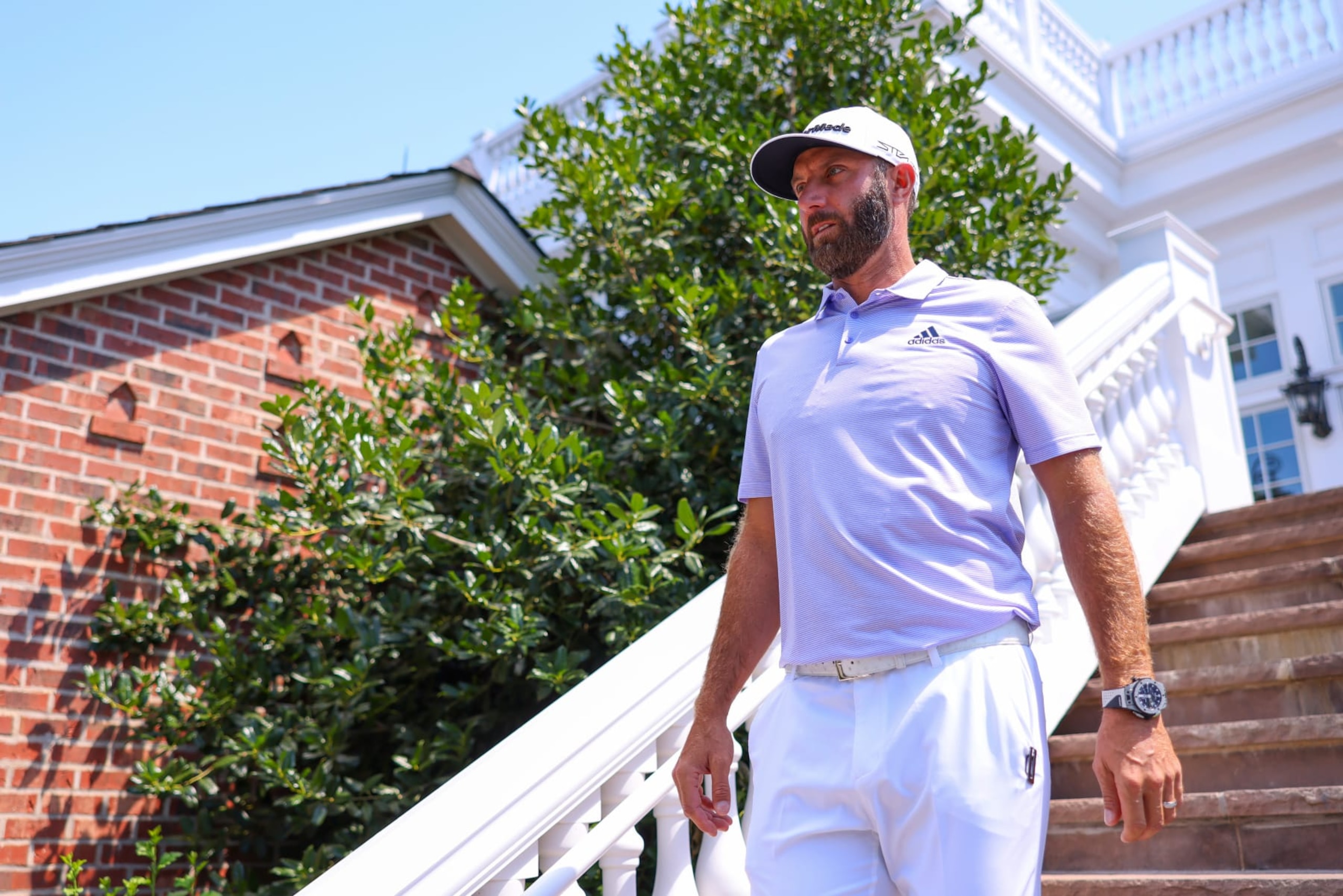 BEDMINSTER, NEW JERSEY - JULY 30: Team Captain Dustin Johnson of 4 Aces GC walks to the course during day two of the LIV Golf Invitational - Bedminster at Trump National Golf Club Bedminster on July 30, 2022 in Bedminster, New Jersey. (Photo by Chris Trotman/LIV Golf via Getty Images) BEDMINSTER, NEW JERSEY - JULY 30: Team Captain Dustin Johnson of 4 Aces GC walks to the course during day two of the LIV Golf Invitational - Bedminster at Trump National Golf Club Bedminster on July 30, 2022 in Bedminster, New Jersey. (Photo by Chris Trotman/LIV Golf via Getty Images)
