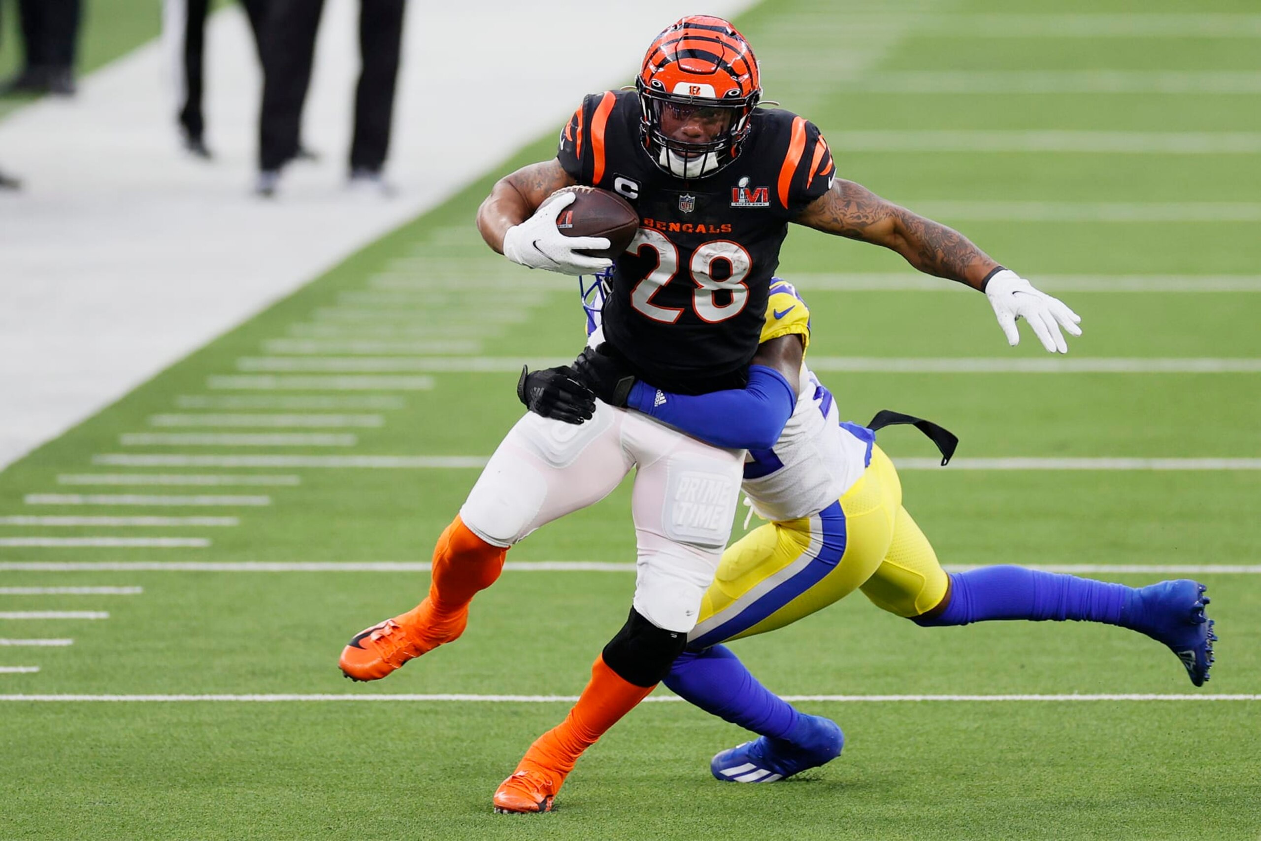 INGLEWOOD, CALIFORNIA - FEBRUARY 13: Joe Mixon #28 of the Cincinnati Bengals runs with the ball during Super Bowl LVI at SoFi Stadium on February 13, 2022 in Inglewood, California. The Los Angeles Rams defeated the Cincinnati Bengals 23-20.  (Photo by Steph Chambers/Getty Images)