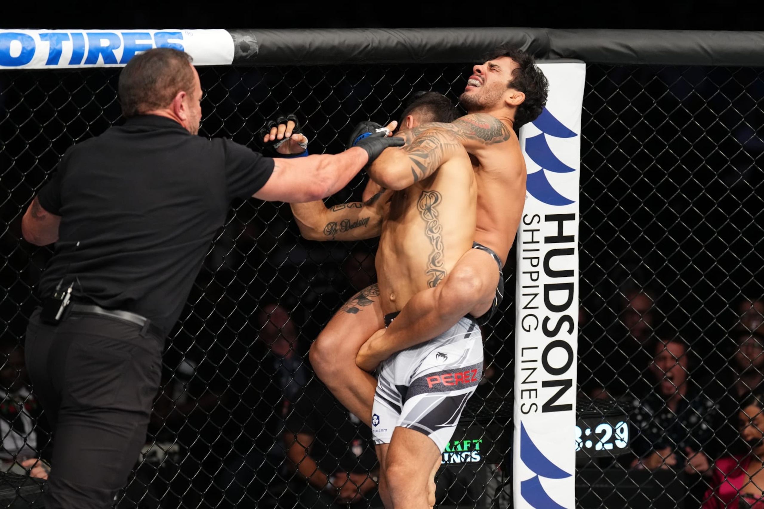 DALLAS, TEXAS - JULY 30: (R-L) Alexandre Pantoja of Brazil attempts to submit Alex Perez in a flyweight fight during the UFC 277 event at American Airlines Center on July 30, 2022 in Dallas, Texas. (Photo by Josh Hedges/Zuffa LLC)