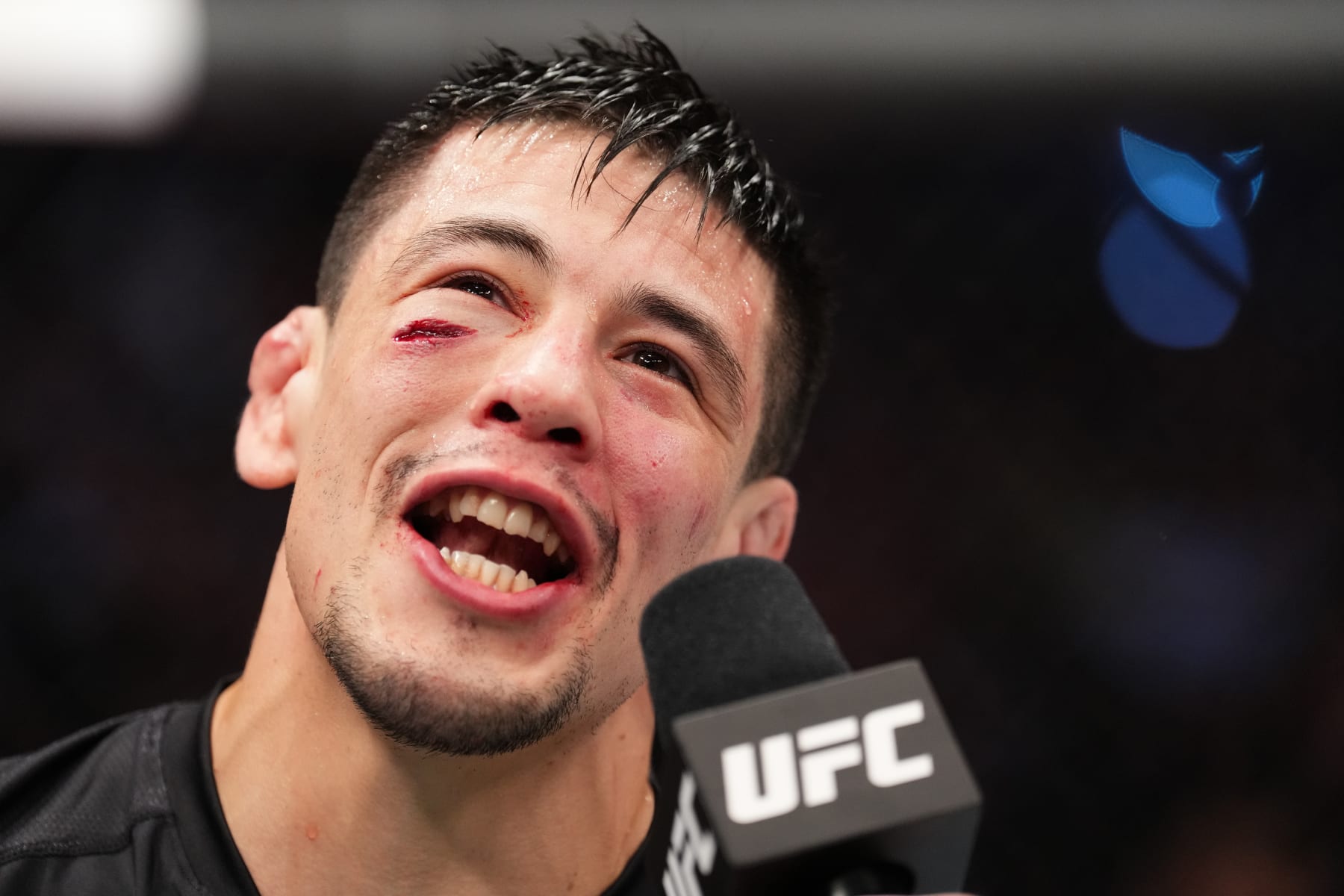 DALLAS, TEXAS - JULY 30: Brandon Moreno of Mexico reacts after defeating Kai Kara-France of New Zealand in the interim UFC flyweight championship fight during the UFC 277 event at American Airlines Center on July 30, 2022 in Dallas, Texas. (Photo by Josh Hedges/Zuffa LLC)