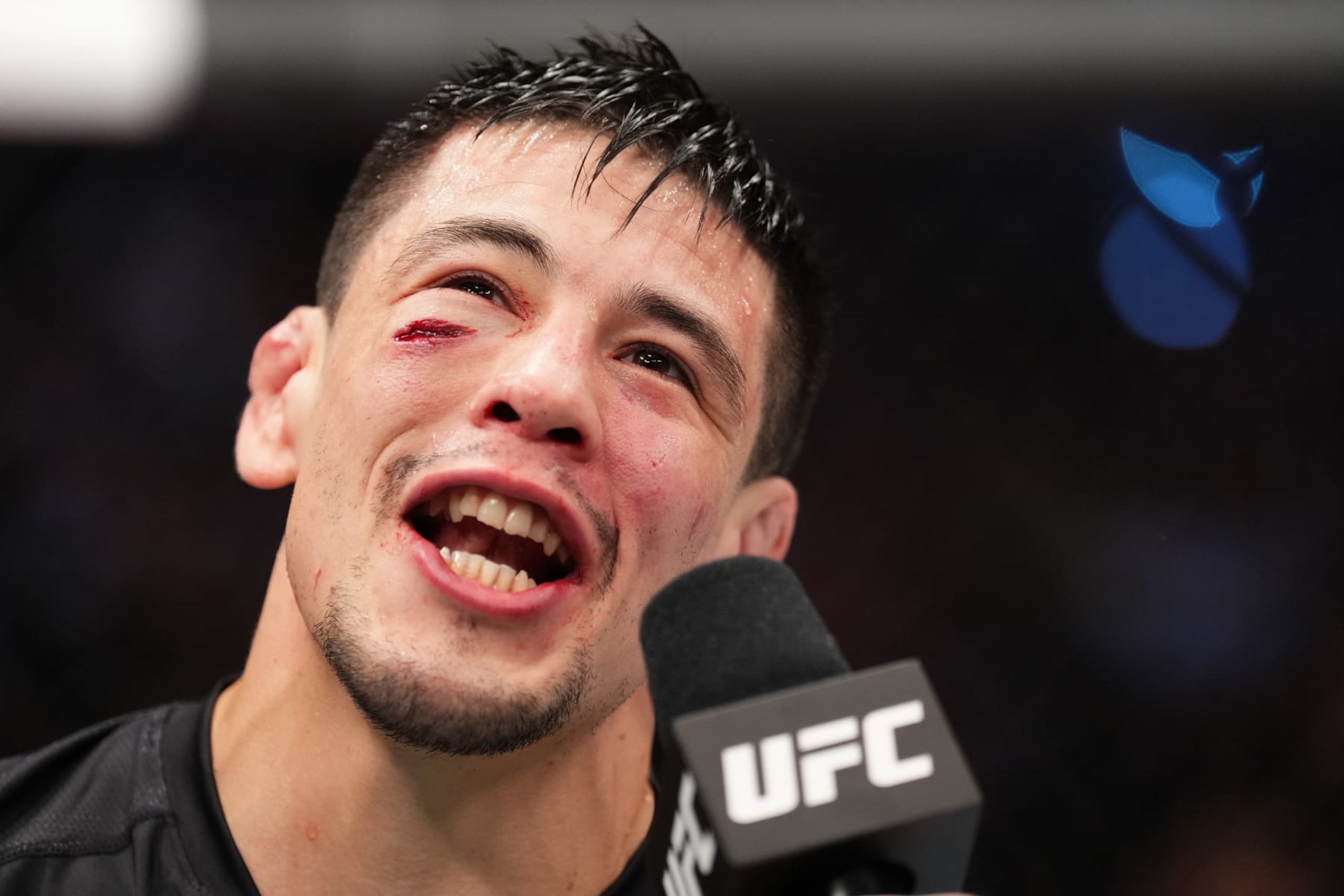 DALLAS, TEXAS - JULY 30: Brandon Moreno of Mexico reacts after defeating Kai Kara-France of New Zealand in the interim UFC flyweight championship fight during the UFC 277 event at American Airlines Center on July 30, 2022 in Dallas, Texas. (Photo by Josh Hedges/Zuffa LLC)