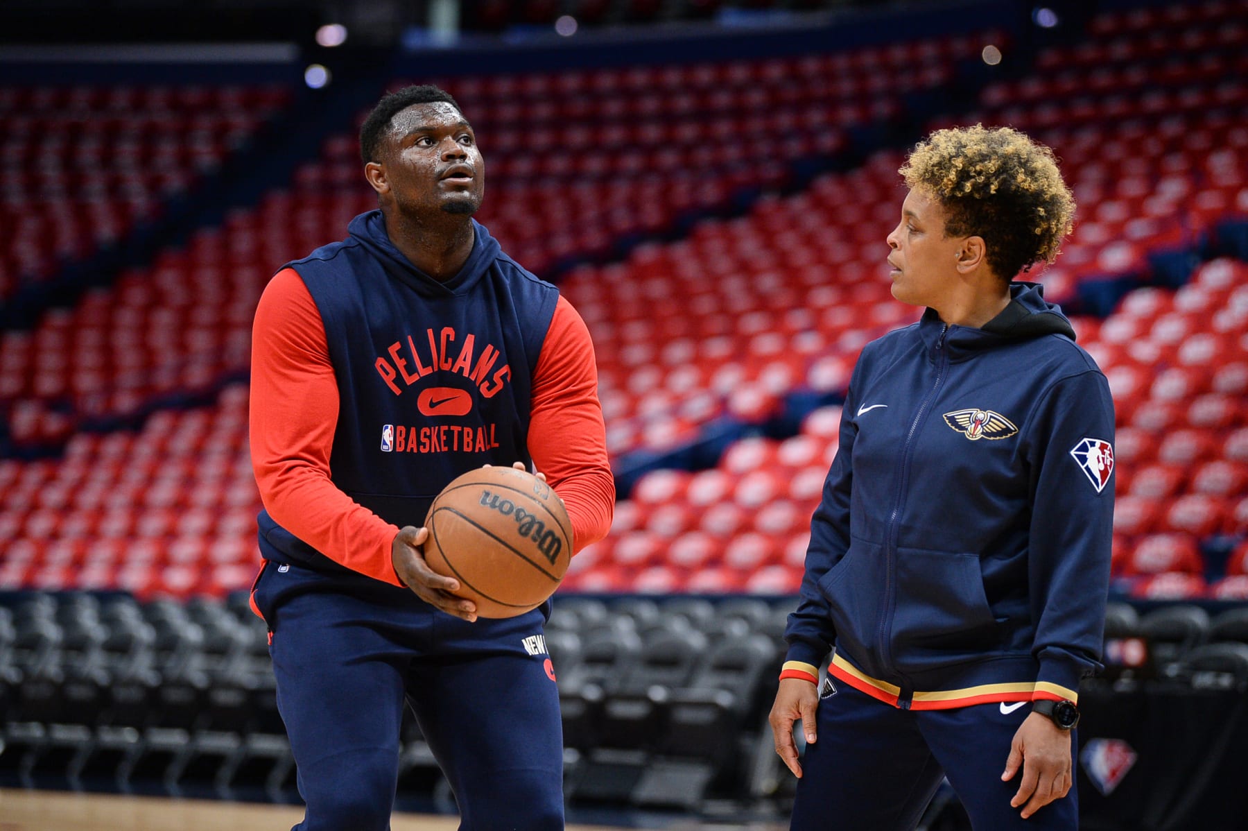 NEW ORLEANS, LA - APRIL 28: Zion Williamson #1 works with Assistant Coach Teresa Weatherspoon of the New Orleans Pelicans before the game against the New Orleans Pelicans during Round 1 Game 6 of the 2022 NBA Playoffs on April 28, 2022 at the Smoothie King Center in New Orleans, Louisiana. NOTE TO USER: User expressly acknowledges and agrees that, by downloading and or using this Photograph, user is consenting to the terms and conditions of the Getty Images License Agreement. Mandatory Copyright Notice: Copyright 2022 NBAE (Photo by David Dow/NBAE via Getty Images)