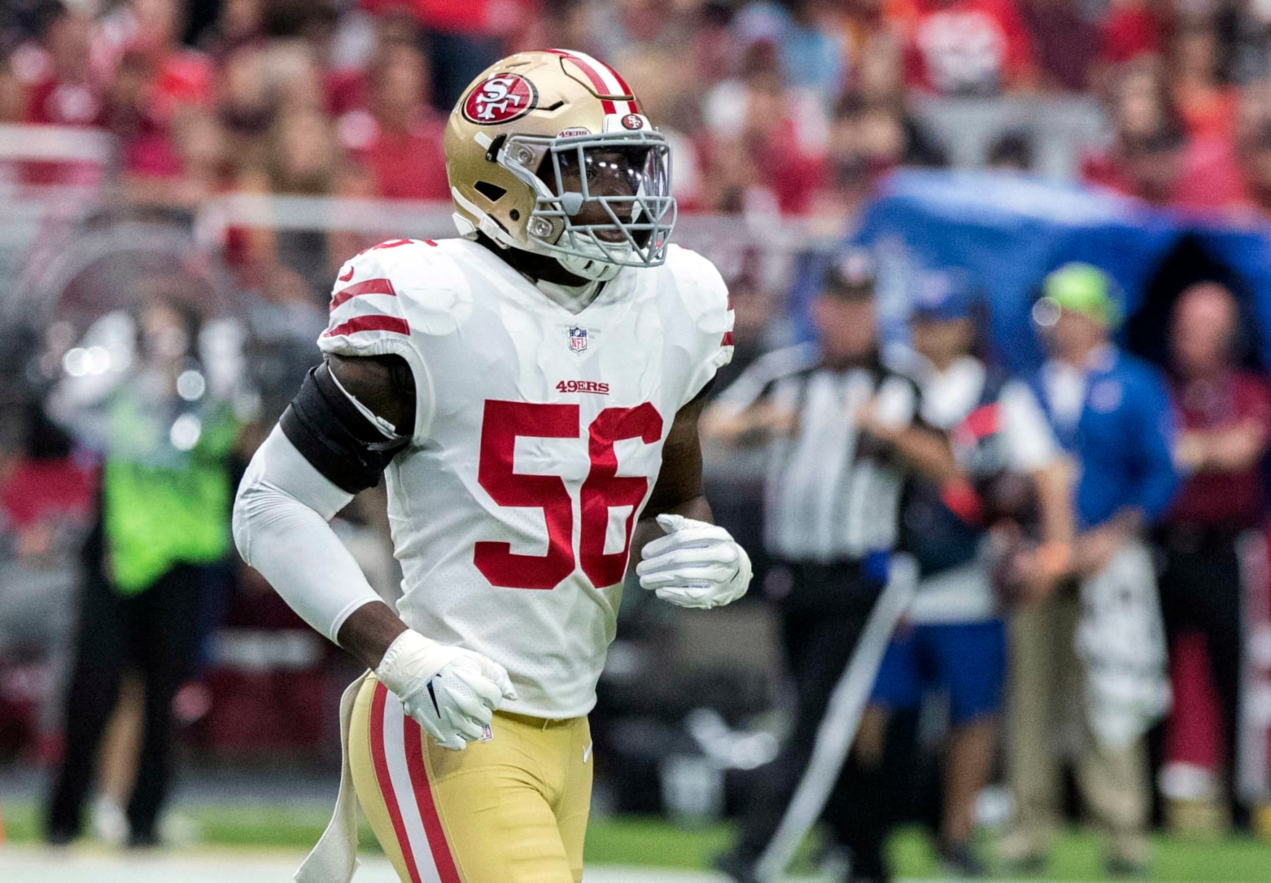 FILE - In this Oct. 28, 2018, file photo, San Francisco 49ers' Reuben Foster (56) jogs on the field during the first half of an NFL football game against the Arizona Cardinals in Glendale, Ariz. The Washington Redskins claimed Foster off waivers on Tuesday, Nov. 27, 2018, after the 49ers released the linebacker following a domestic violence arrest. The team says conversations with former Alabama teammates led to the decision to claim Foster. (AP Photo/Darryl Webb, File)