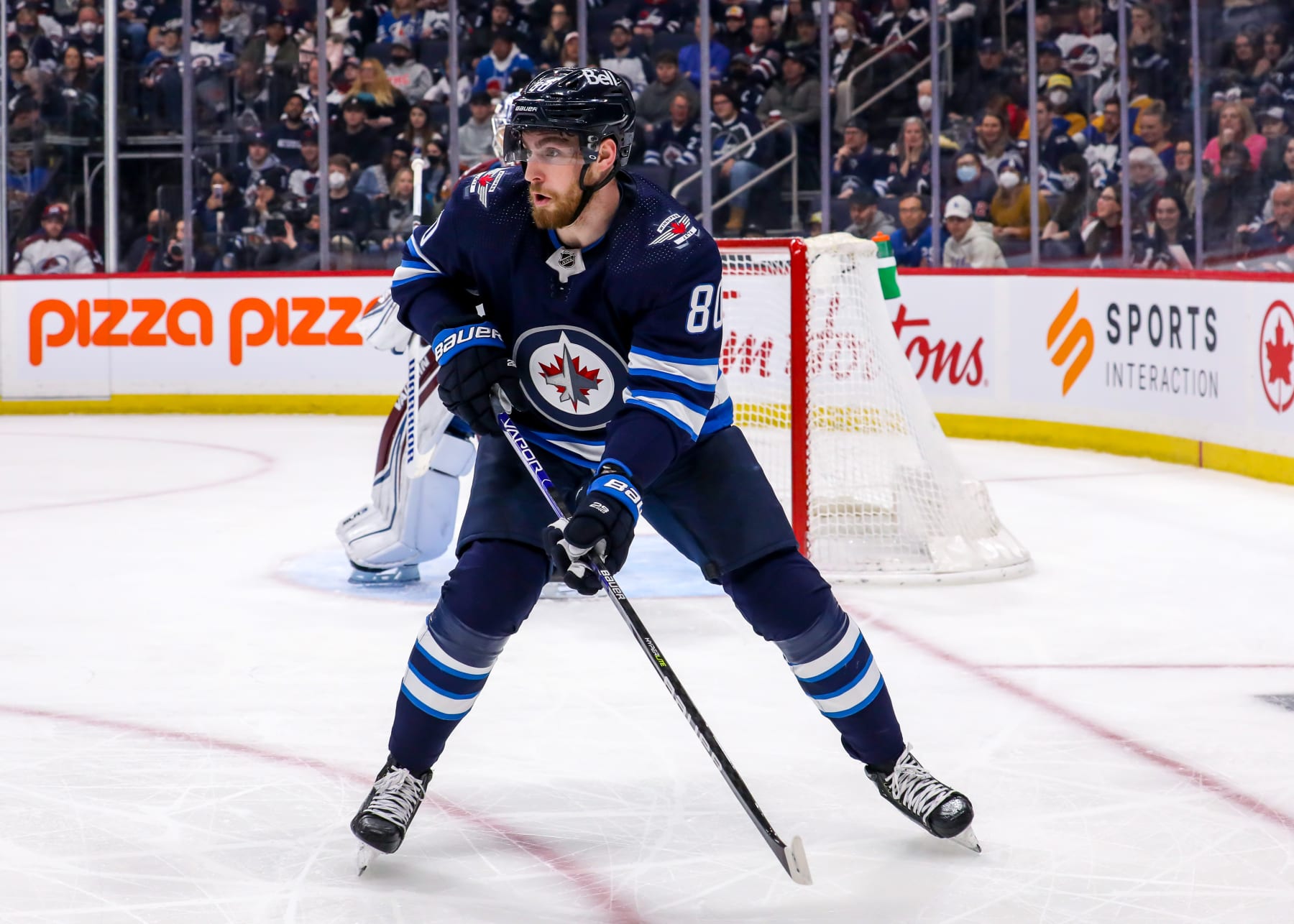 WINNIPEG, MB - APRIL 24: Pierre-Luc Dubois #80 of the Winnipeg Jets keeps an eye on the play during first period action against the Colorado Avalanche at Canada Life Centre on April 24, 2022 in Winnipeg, Manitoba, Canada. (Photo by Darcy Finley/NHLI via Getty Images)