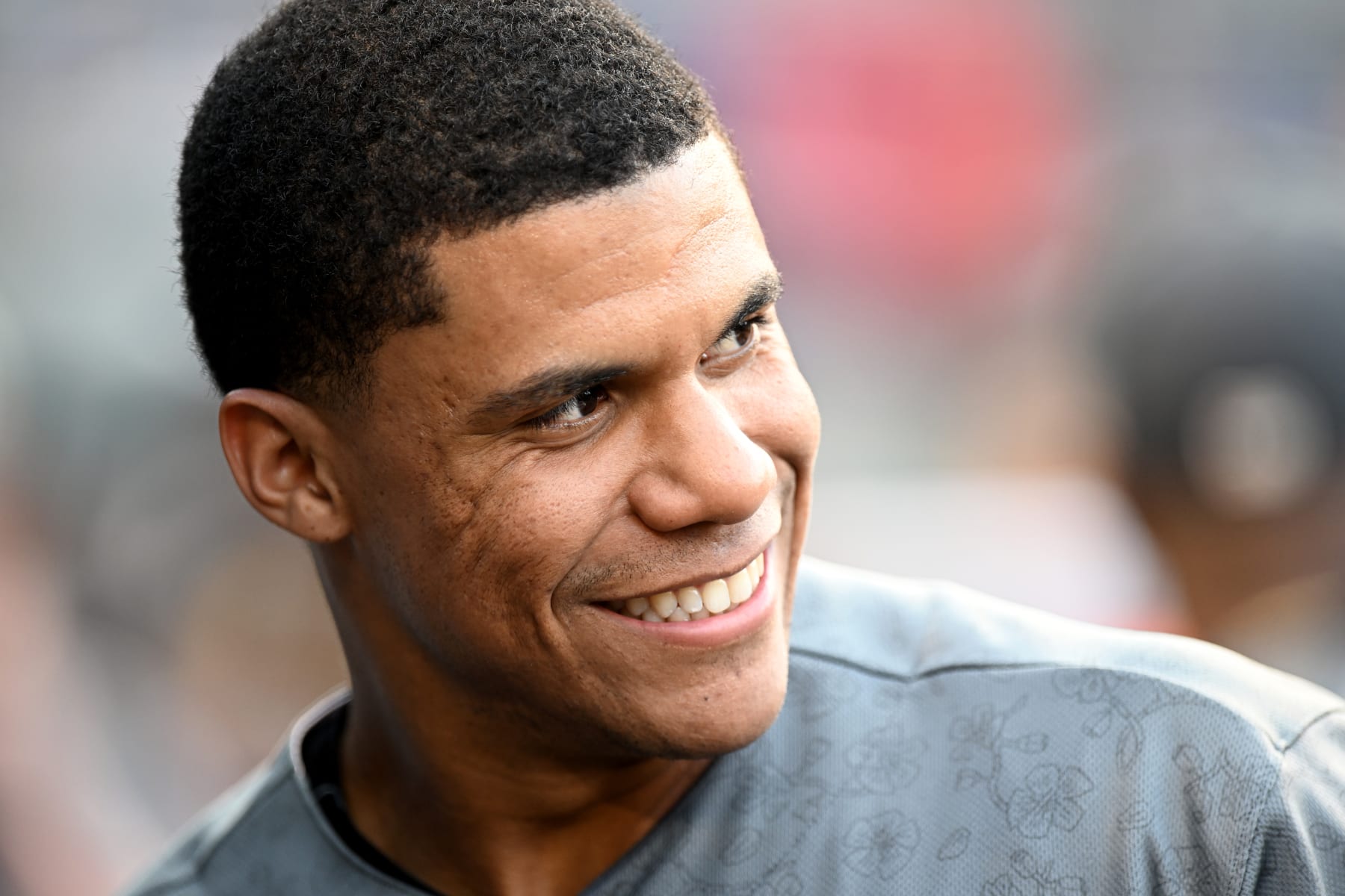 WASHINGTON, DC - JULY 30: Juan Soto #22 of the Washington Nationals talks to teammates before the game against the St. Louis Cardinals at Nationals Park on July 30, 2022 in Washington, DC. (Photo by Greg Fiume/Getty Images)