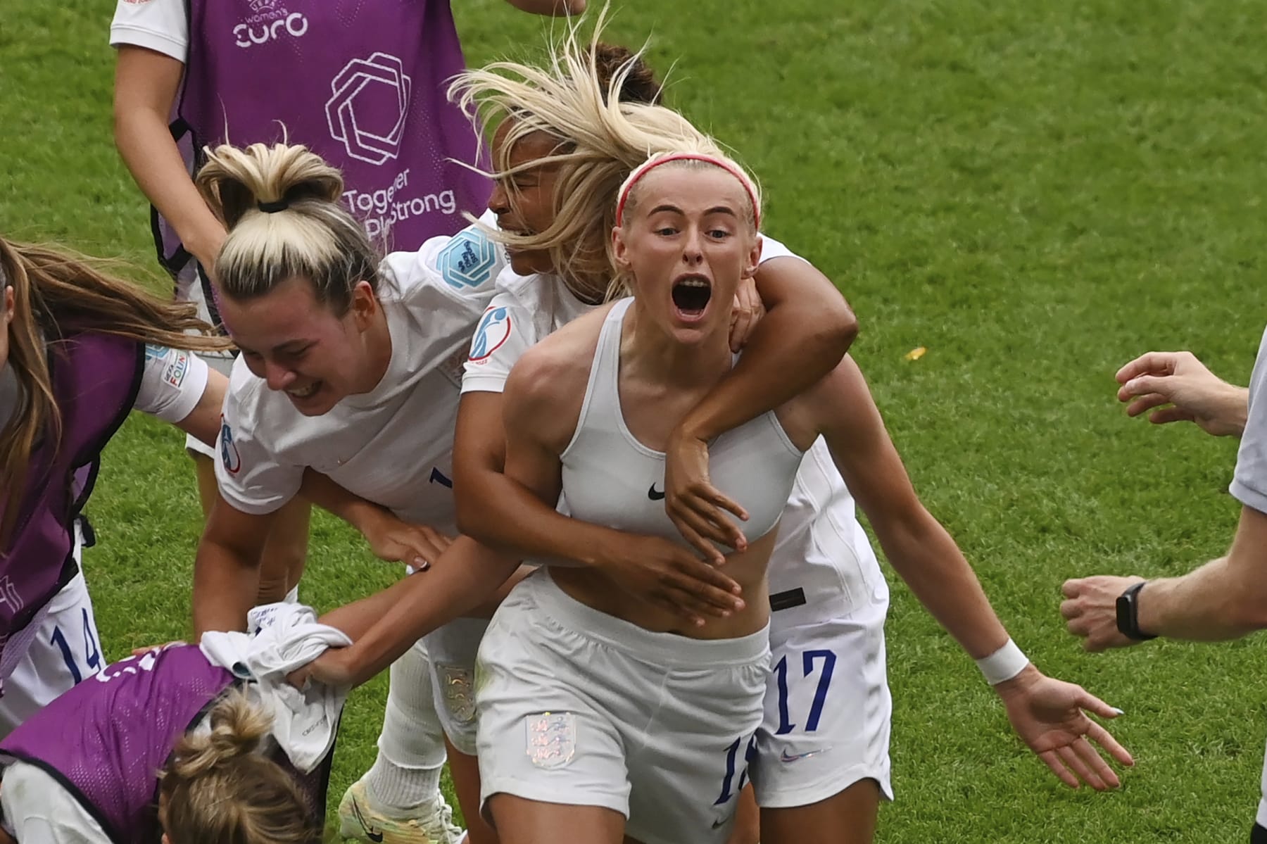 England's Chloe Kelly, centre, celebrates with teammates after scoring her side's second goal during the Women's Euro 2022 final soccer match between England and Germany at Wembley stadium in London, Sunday, July 31, 2022. (AP Photo/Rui Vieira) England's Chloe Kelly, centre, celebrates with teammates after scoring her side's second goal during the Women's Euro 2022 final soccer match between England and Germany at Wembley stadium in London, Sunday, July 31, 2022. (AP Photo/Rui Vieira)