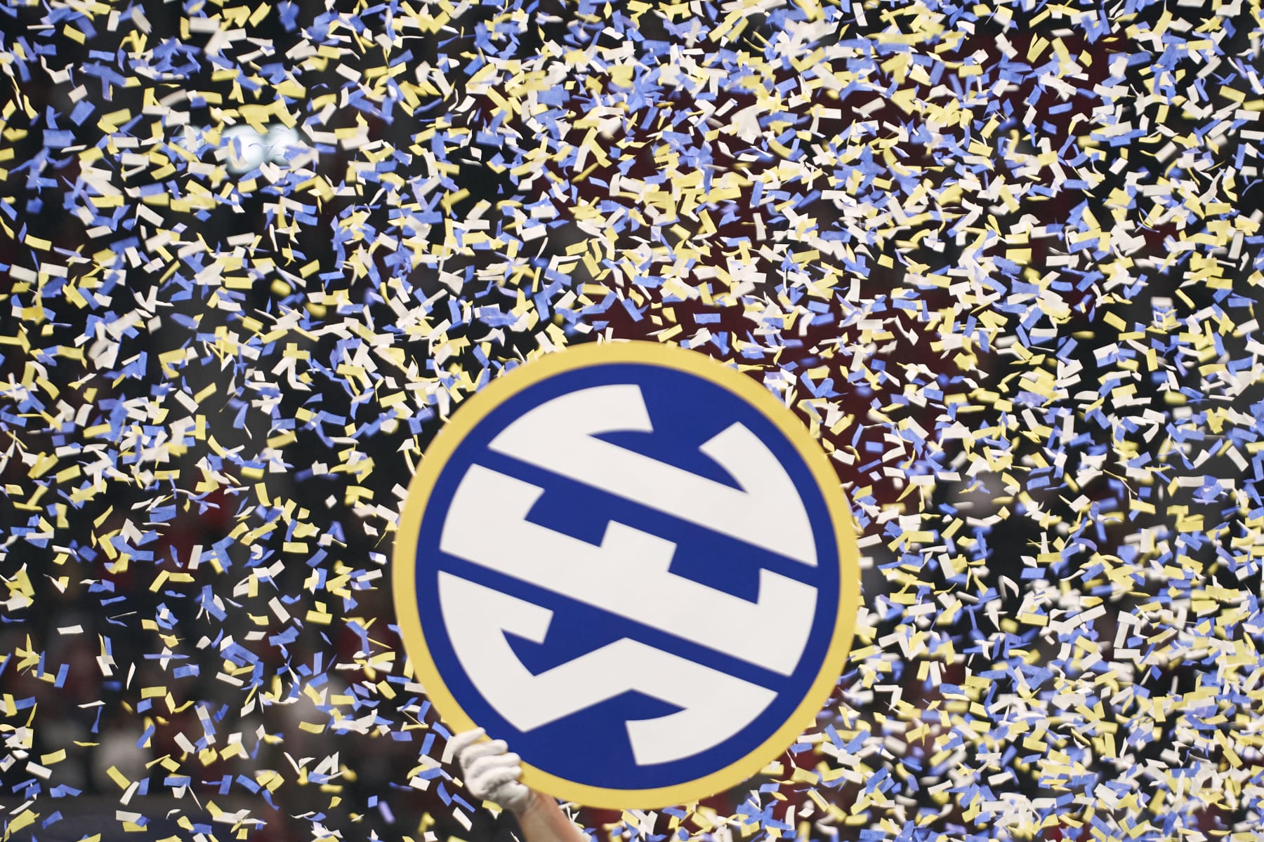 College Football: SEC Championship: View of SEC logo held up by Alabama player surrounded by confetti coming down after game vs Georgia at Mercedes-Benz Stadium. Atlanta, GA 12/4/2021 CREDIT: Kevin D. Liles (Photo by Kevin D. Liles/Sports Illustrated via Getty Images) (Set Number: X163878 TK1)