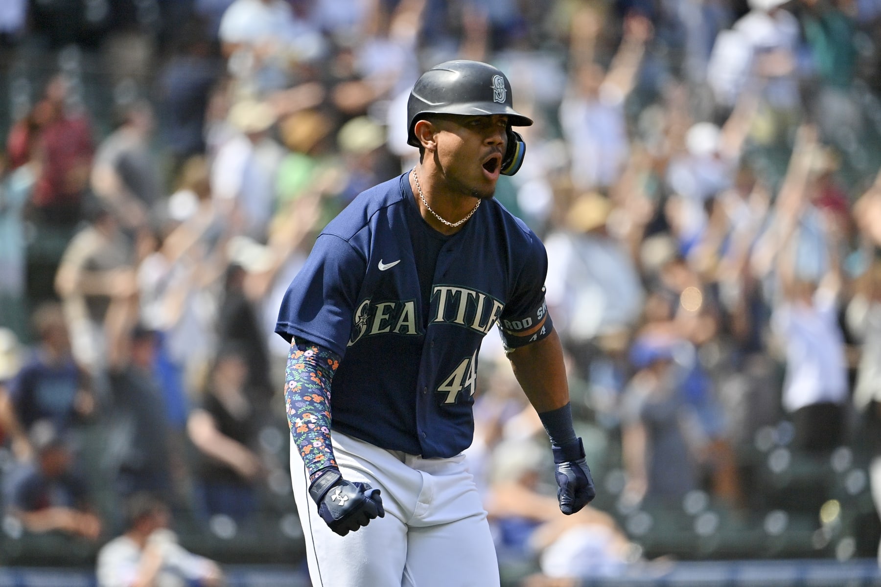 SEATTLE, WASHINGTON - JULY 27: Julio Rodriguez #44 of the Seattle Mariners reacts after hitting a three run home run during the seventh inning against the Texas Rangers at T-Mobile Park on July 27, 2022 in Seattle, Washington. (Photo by Alika Jenner/Getty Images)