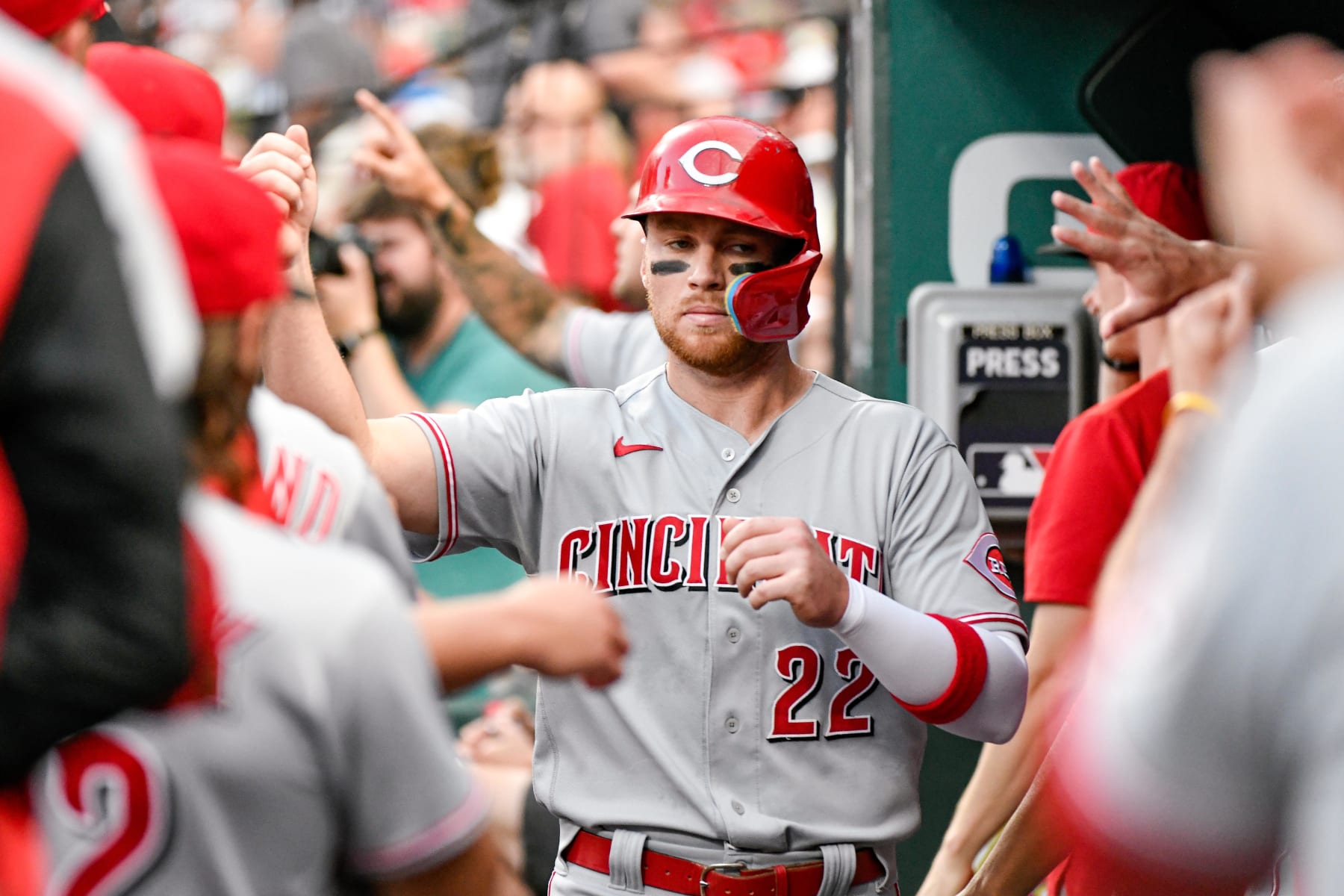 ST. LOUIS, MO - JULY 15: Cincinnati Reds third baseman Brandon Drury (22) is congratulated by teammates after scoring a run during a game between the Cincinnati Reds and the St. Louis Cardinals on July 15, 2022, at Busch Stadium in St. Louis MO (Photo by Rick Ulreich/Icon Sportswire via Getty Images)