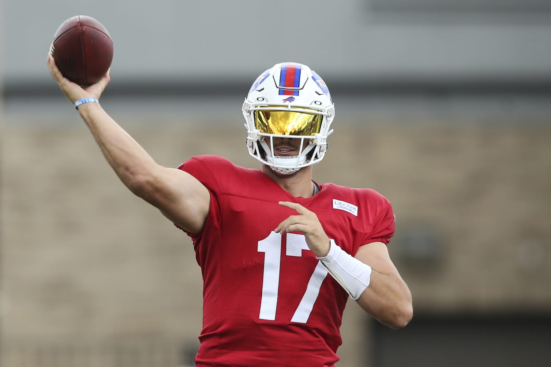 Buffalo Bills quarterback Josh Allen (17) throws during practice at the NFL football team's training camp in Pittsford, N.Y., Saturday July 30, 2022. (AP Photo/Joshua Bessex)