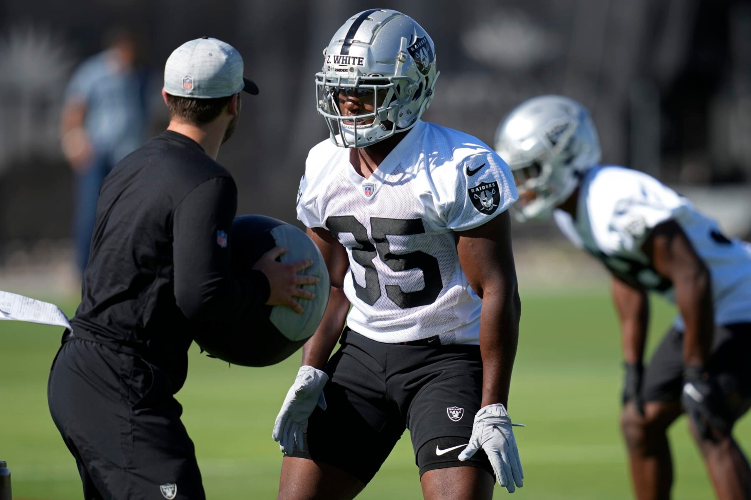 Las Vegas Raiders' Zamir White practices during NFL football training camp, Thursday, July 21, 2022, in Henderson, Nev. (AP Photo/John Locher)