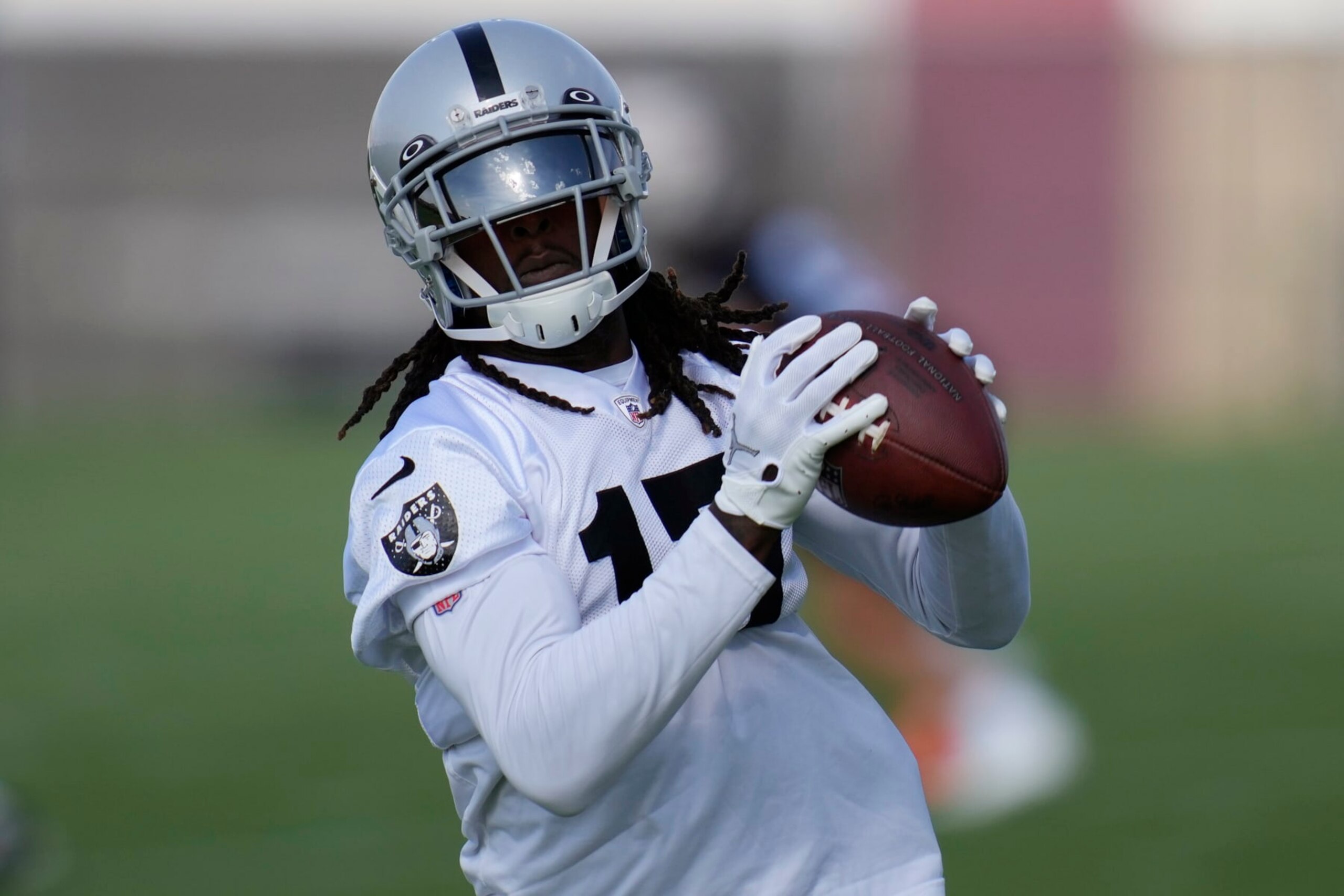 Las Vegas Raiders' Davante Adams practices during NFL football training camp, Friday, July 22, 2022, in Henderson, Nev. (AP Photo/John Locher)